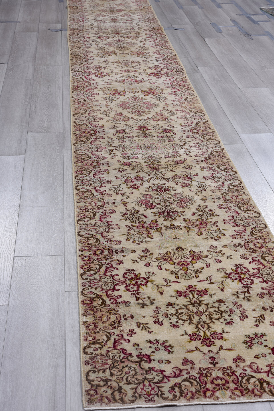 2' x 20' one-of-a-kind handmade vintage Kerman runner rug. Color palette: brown, gray, red, light gray, off-white, pink