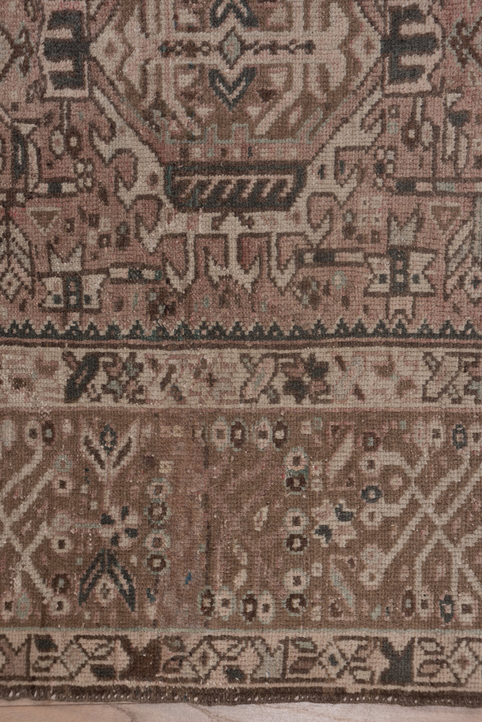 7' x 10' one-of-a-kind handmade vintage Karaje large size rug. Color palette: pink, gray, off-white, brown, light gray