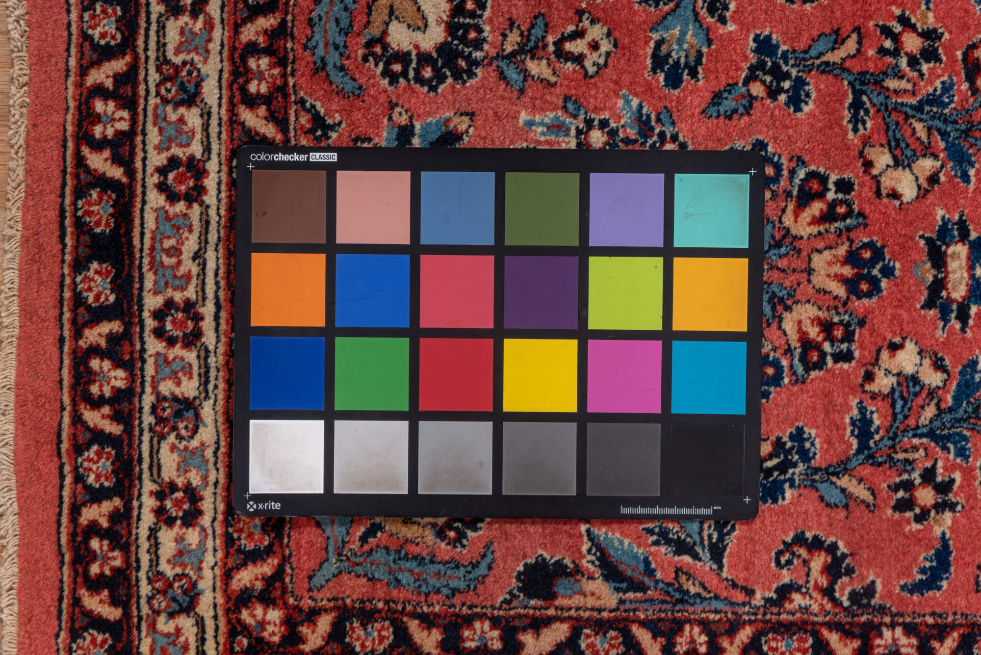 2' x 4' one-of-a-kind handmade vintage Kashan small size rug. Color palette: black, blue, brown, gray, orange, pink, red