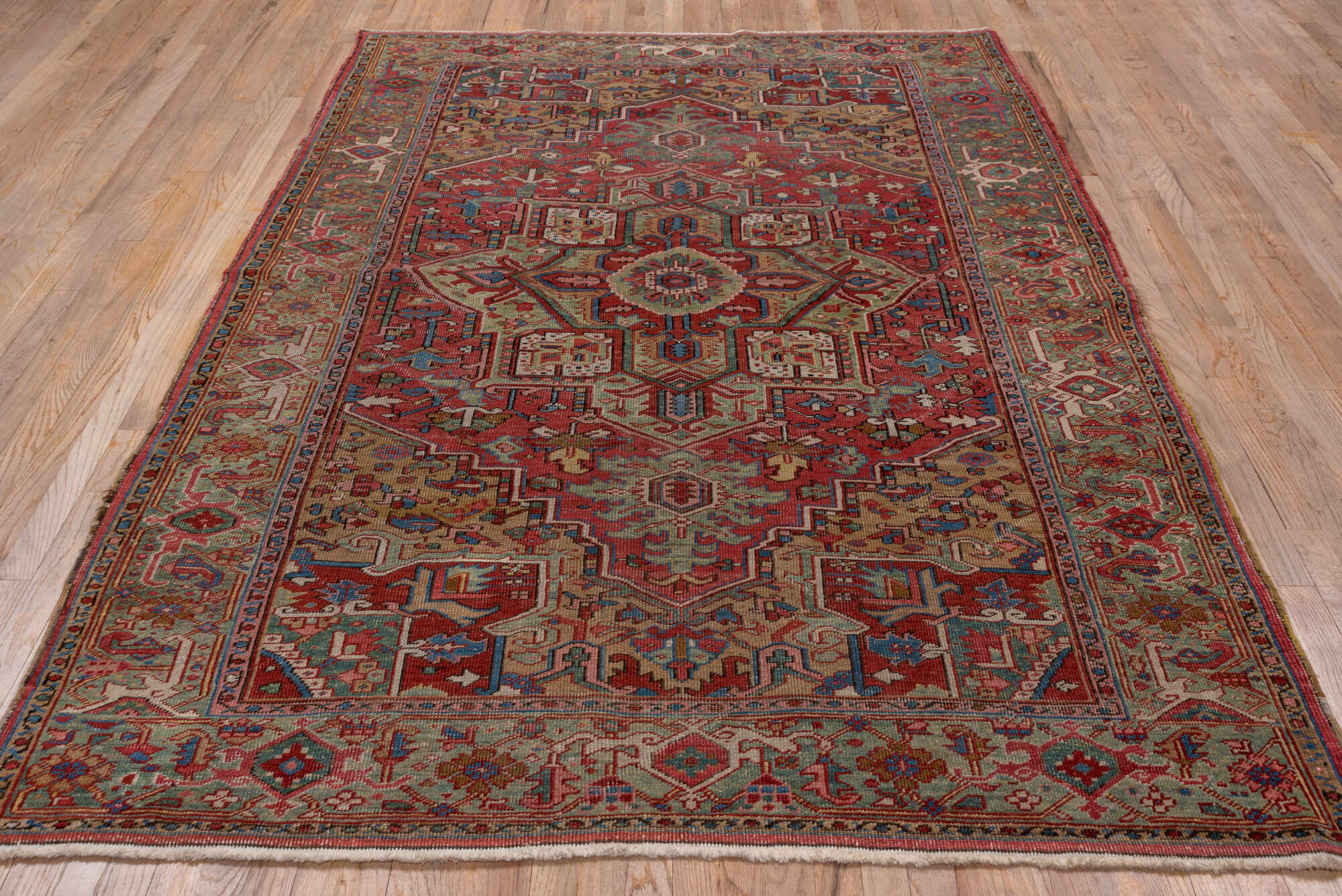 6' x 8' one-of-a-kind handmade vintage Heriz medium size rug. Color palette: blue, brown, gray, pink