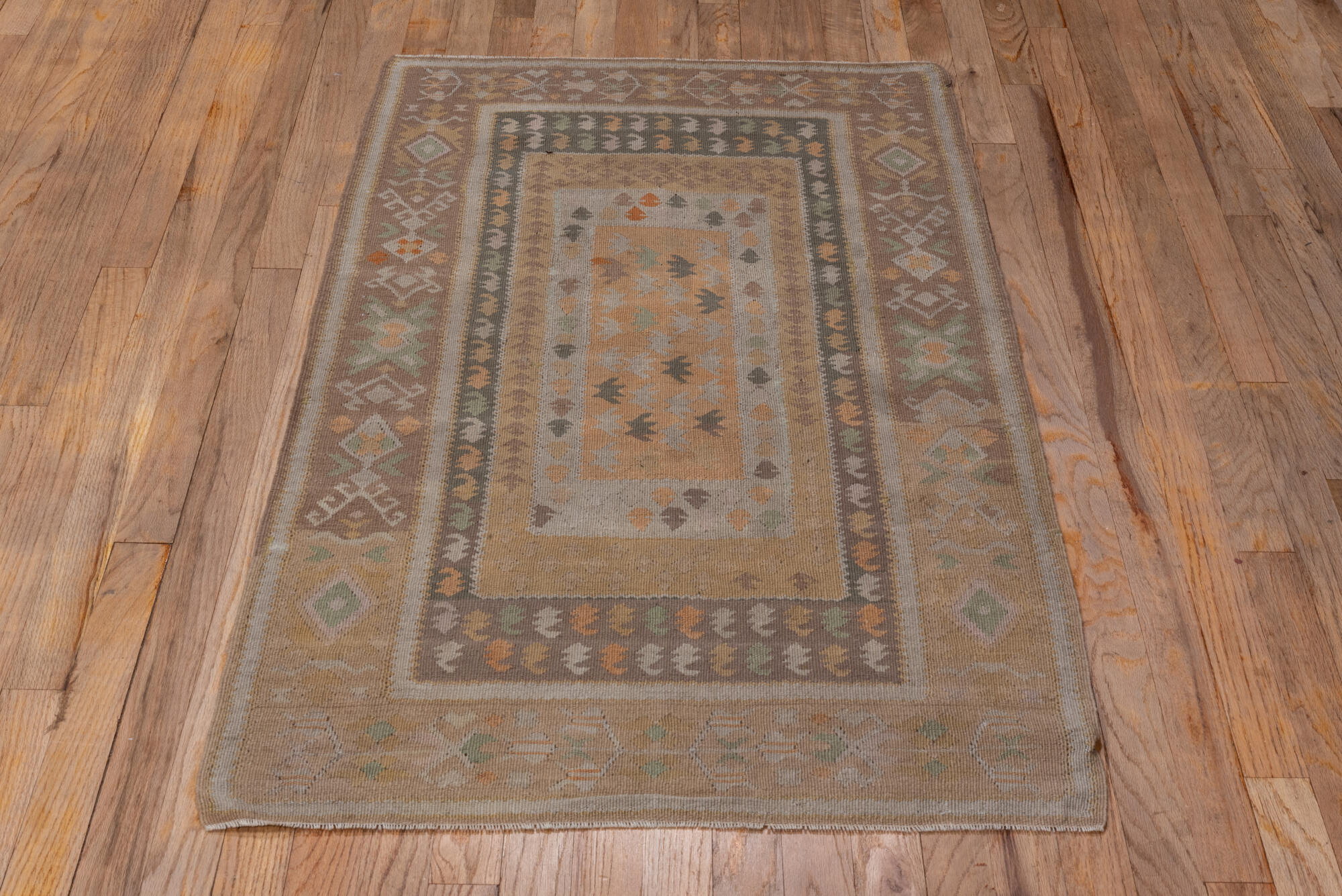 2' x 4' one-of-a-kind handmade vintage Kilim small size rug. Color palette: gray, light gray, off-white, pink, snow, white