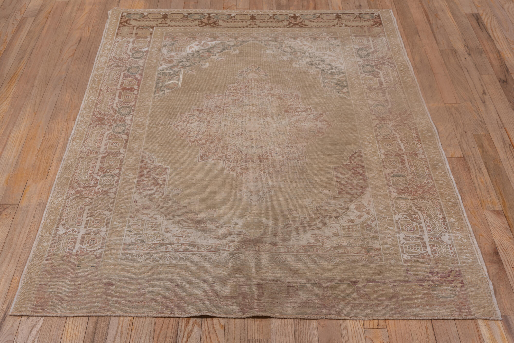 4' x 5' one-of-a-kind handmade vintage Kaisary small size rug. Color palette: brown, gray, light gray, off-white, pink, snow