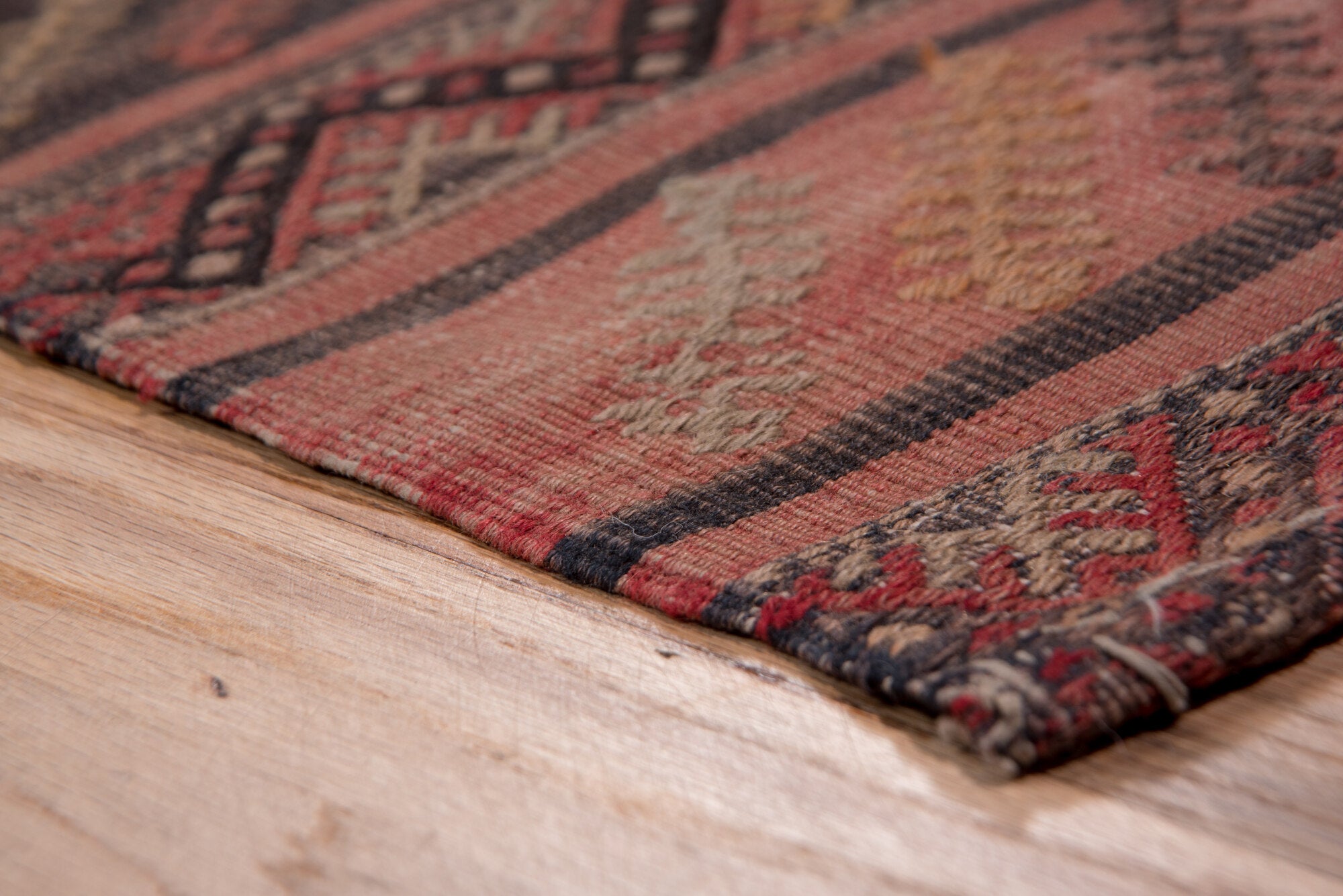 2' x 15' one-of-a-kind handmade vintage Jijim runner rug. Color palette: brown, gray, off-white, pink, red, redwood, snow