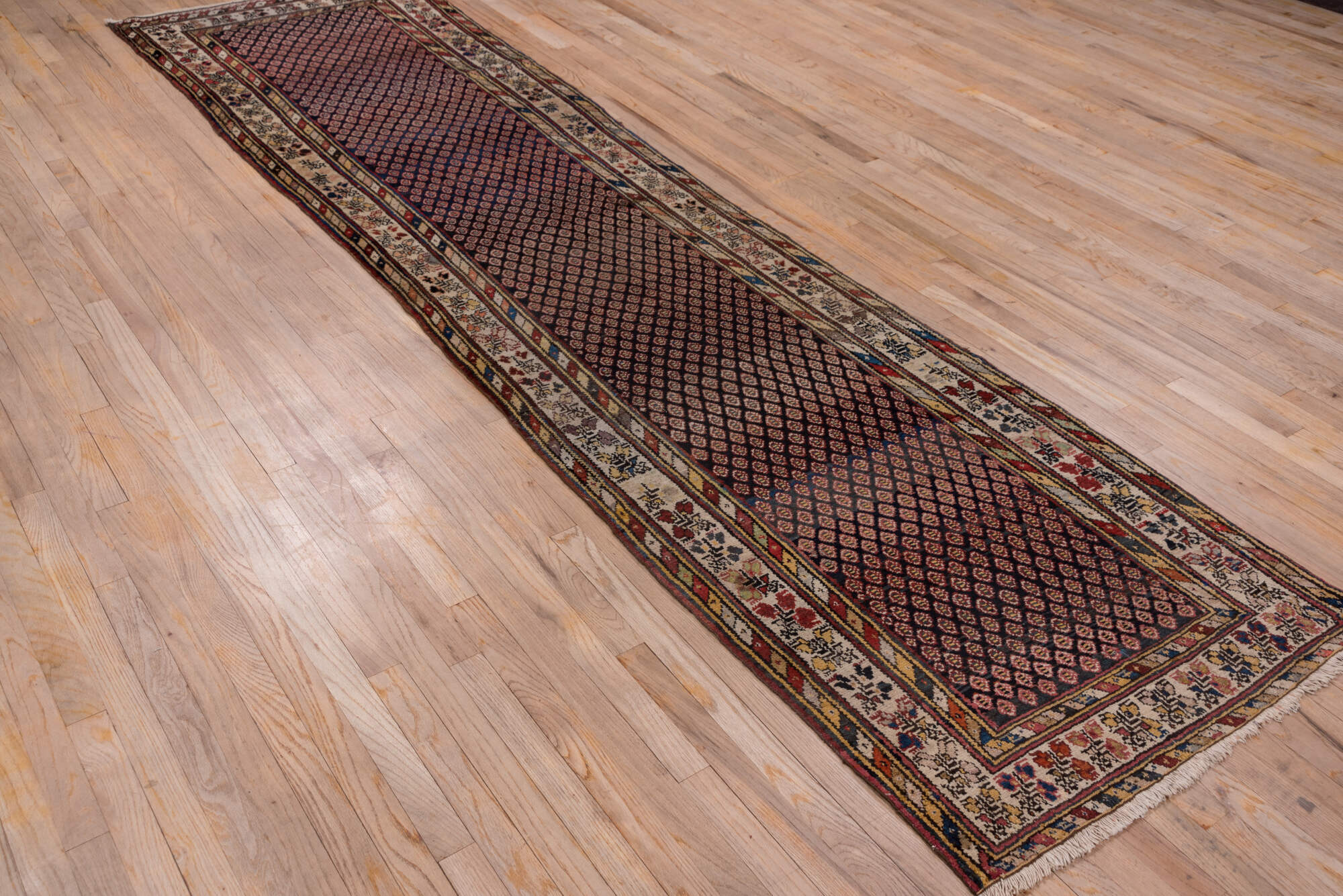3' x 12' one-of-a-kind handmade vintage Malayer runner rug. Color palette: black, brown, gray, pink, red