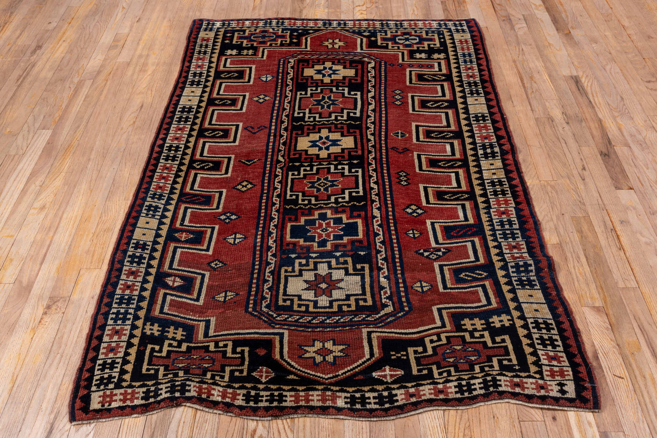 4' x 6' one-of-a-kind handmade vintage Trans Caucasian small size rug. Color palette: red, brown, gray, pink, black, wine