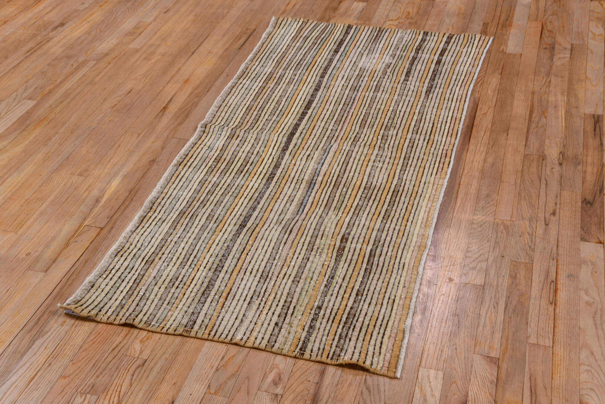 2' x 6' one-of-a-kind handmade vintage Tulu runner rug. Color palette: brown, gray, light gray, off-white, orange, snow