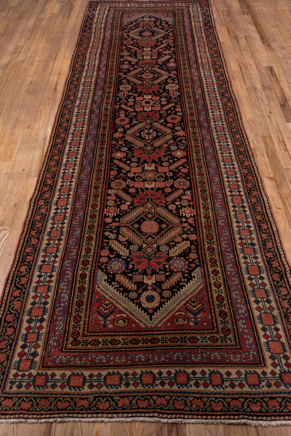 3' x 12' one-of-a-kind handmade vintage Malayer runner rug. Color palette: brown, red, pink, gray
