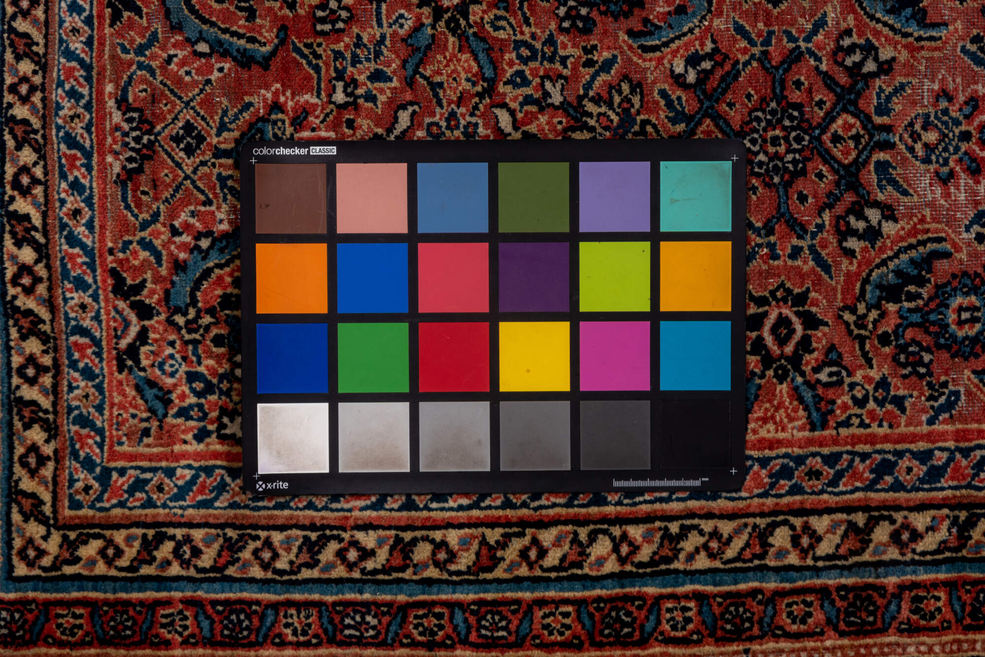 7' x 16' one-of-a-kind handmade vintage Karabagh rug. Color palette: black, blue, brown, gray, pink, red