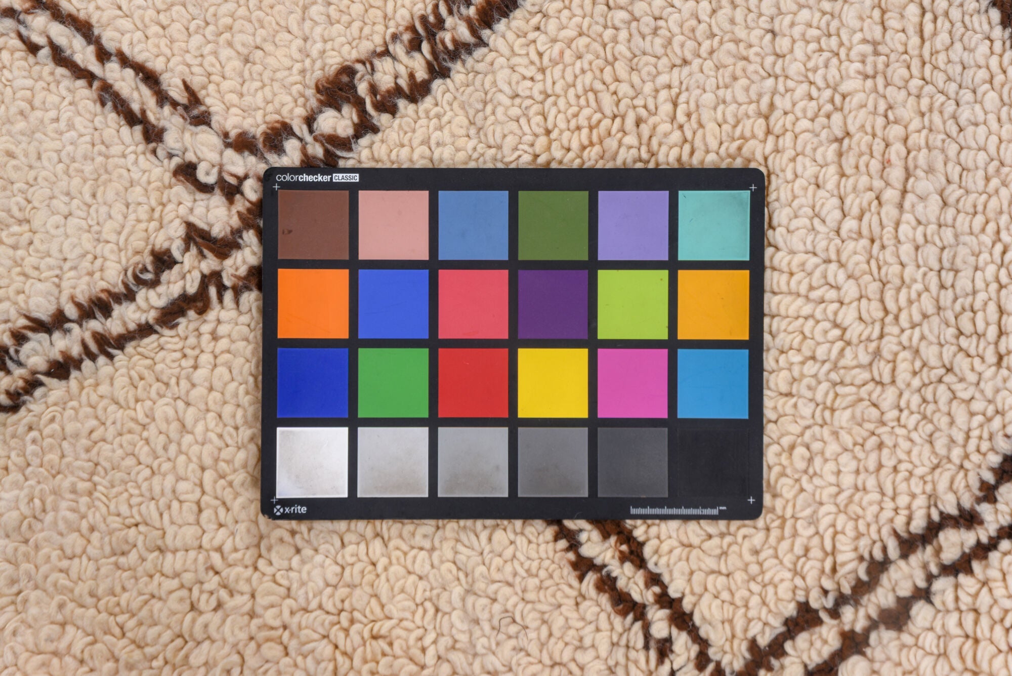 6' x 10' one-of-a-kind handmade vintage Moroccan large size rug. Color palette: brown, off-white, orange