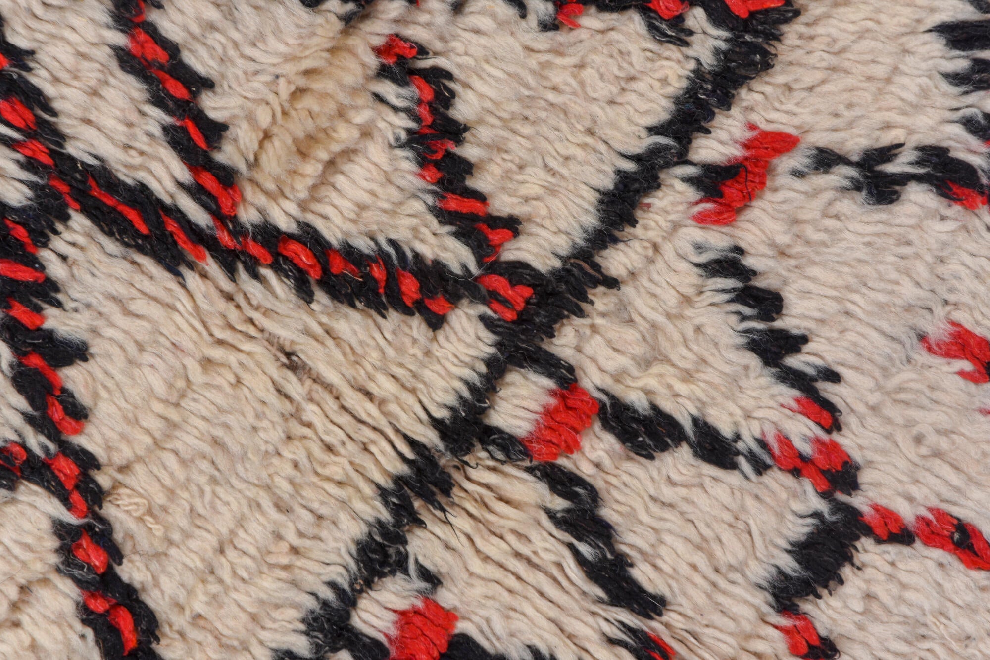 5' x 11' one-of-a-kind handmade vintage Moroccan rug. Color palette: brown, gray, light gray, off-white, pink, red, redwood