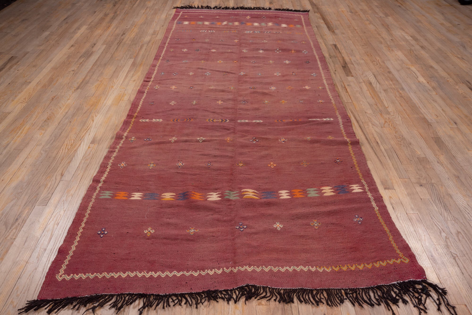 5' x 12' one-of-a-kind handmade vintage Kilim rug. Color palette: brown, gray, light gray, orange, pink, red