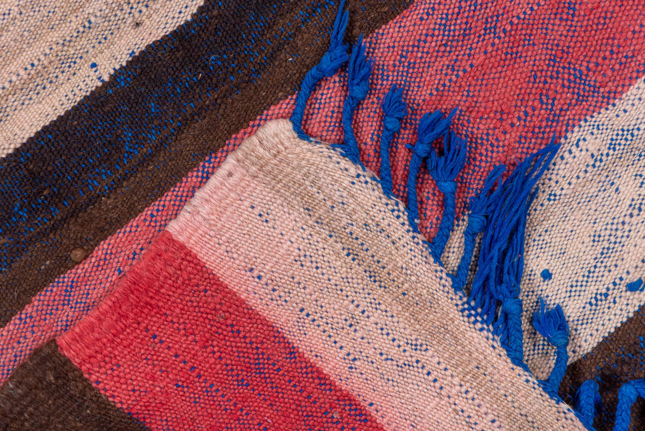 4' x 7' one-of-a-kind handmade vintage Moroccan rug. Color palette: pink, red, gray, brown, blue, black, wine