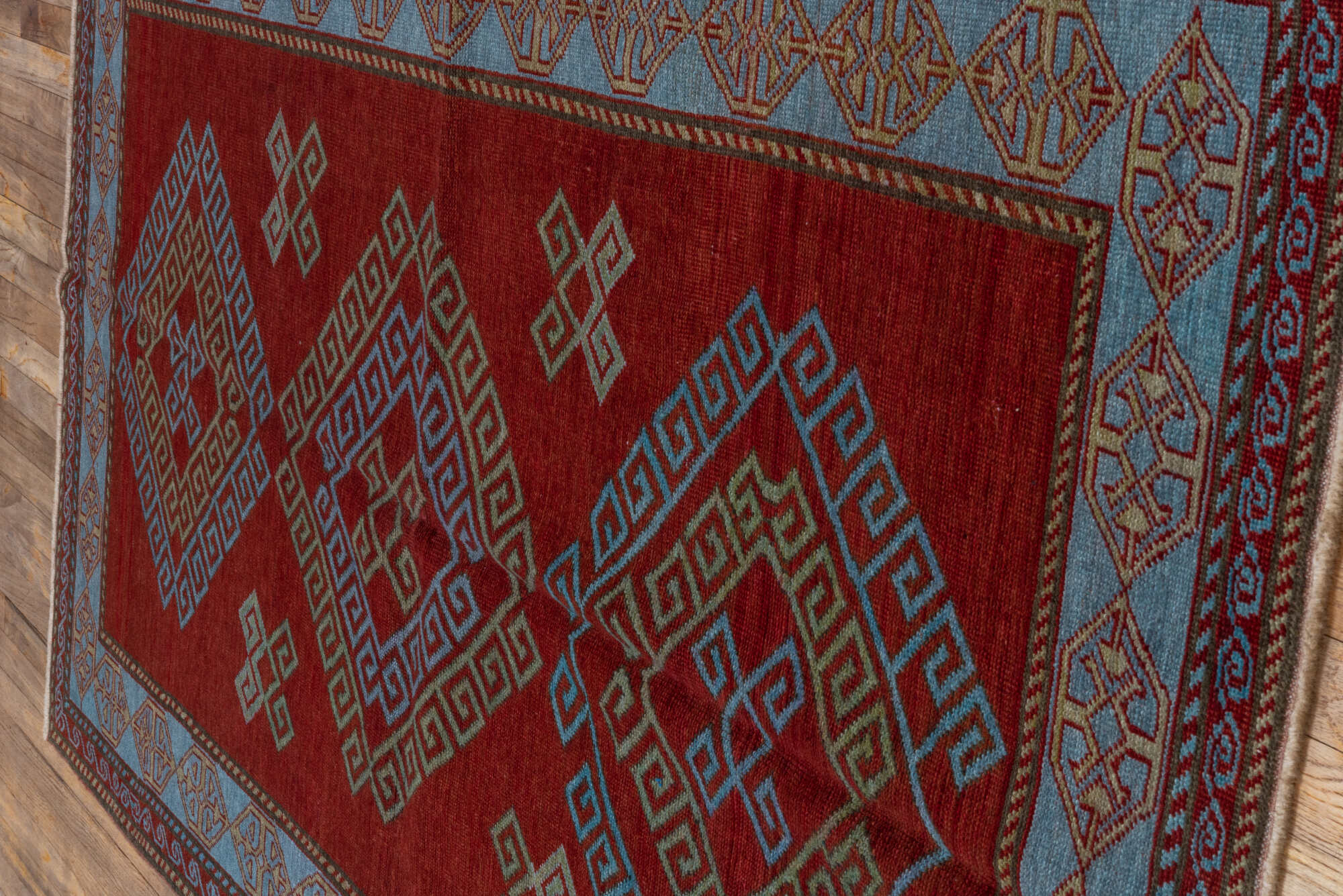 4' x 6' one-of-a-kind handmade vintage Caucasian small size rug. Color palette: brown, red, gray, pink, blue