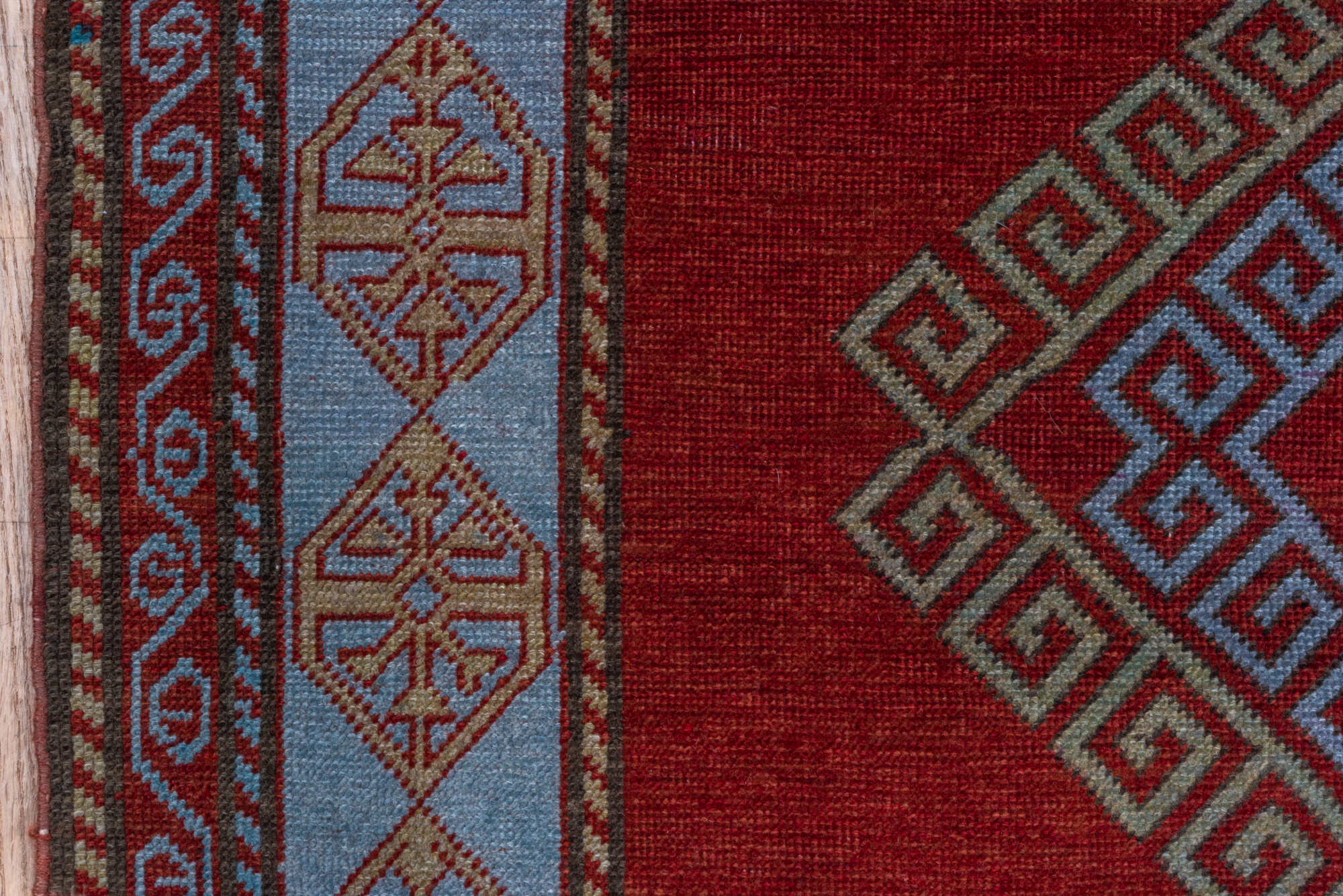 4' x 6' one-of-a-kind handmade vintage Caucasian small size rug. Color palette: brown, red, gray, pink, blue