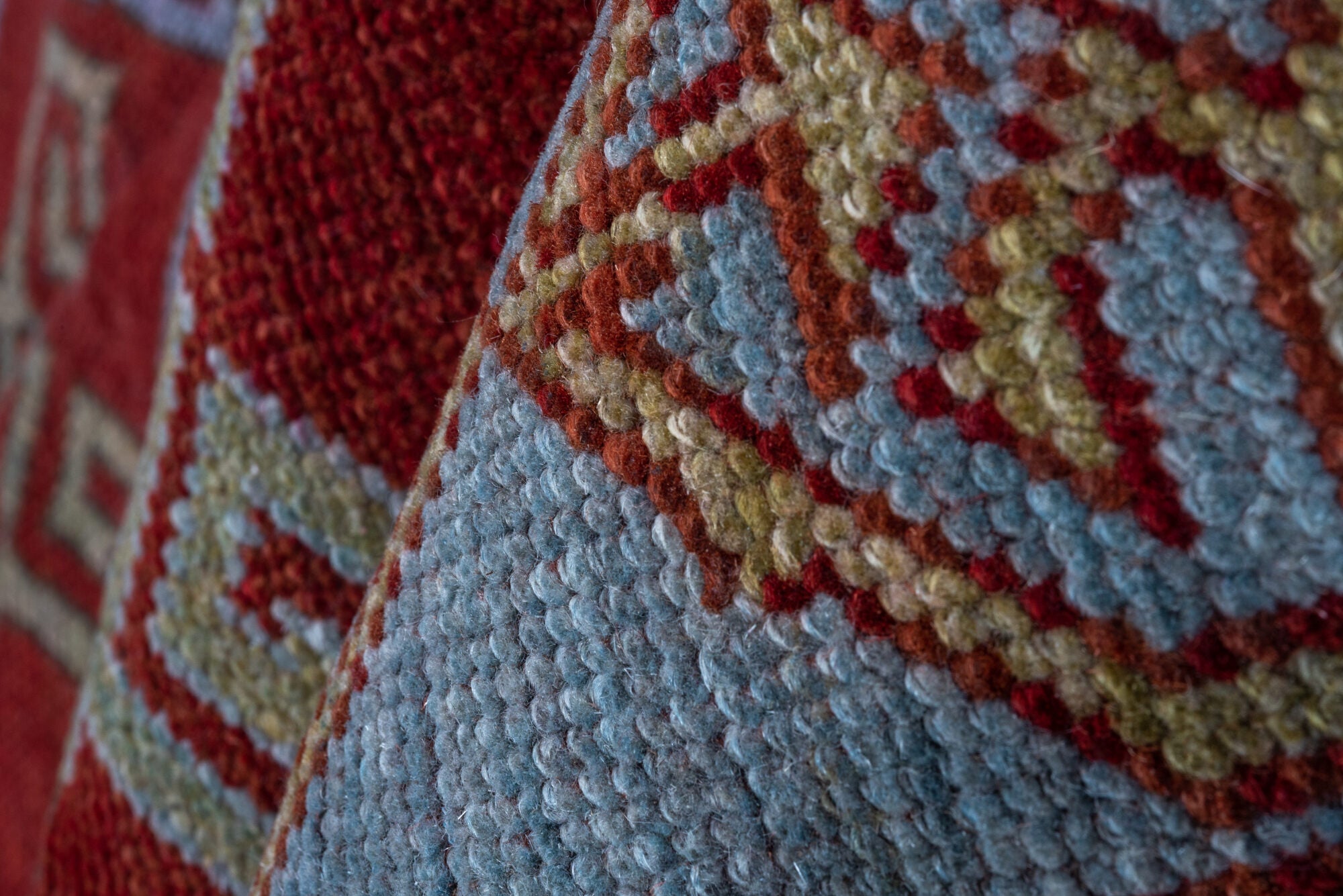 4' x 6' one-of-a-kind handmade vintage Caucasian small size rug. Color palette: brown, red, gray, pink, blue