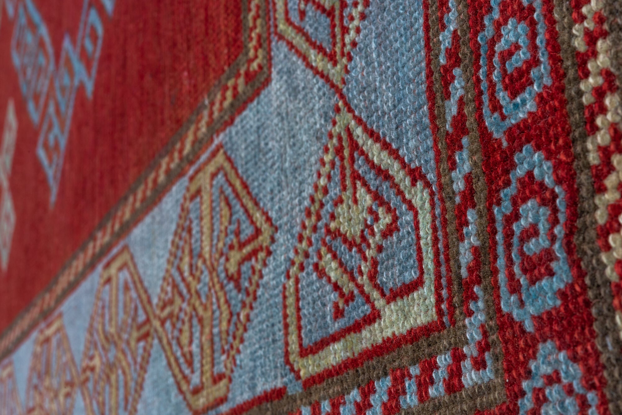 4' x 6' one-of-a-kind handmade vintage Caucasian small size rug. Color palette: brown, red, gray, pink, blue