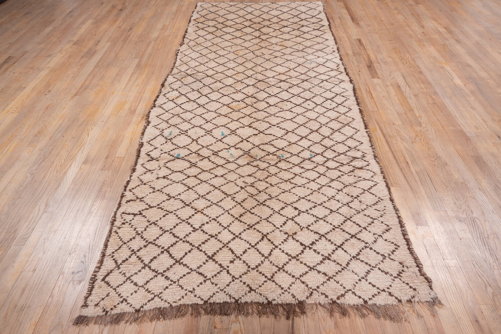 4' x 12' one-of-a-kind handmade vintage Moroccan runner rug. Color palette: brown, gray, light gray, off-white, orange, pink