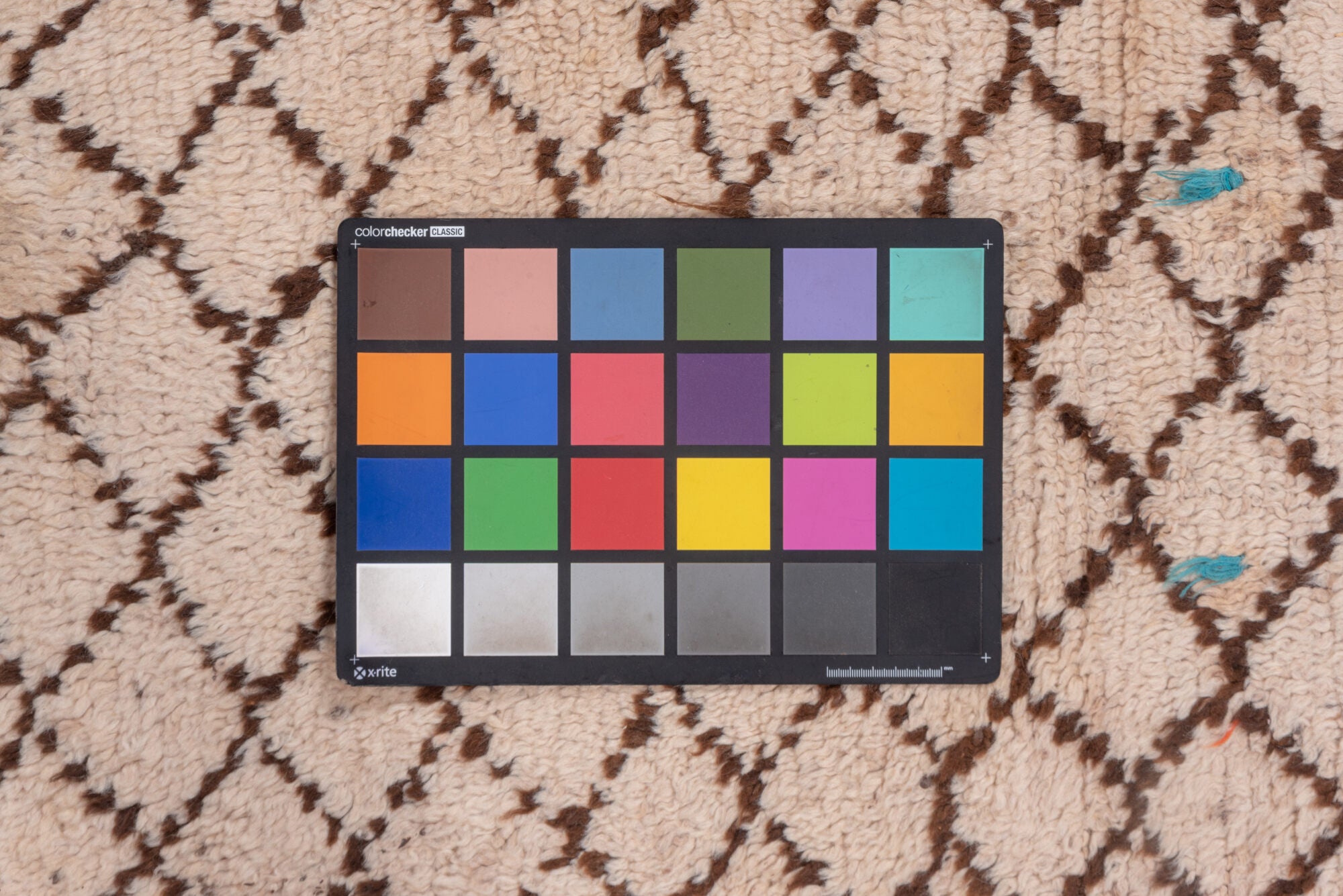 4' x 12' one-of-a-kind handmade vintage Moroccan runner rug. Color palette: brown, gray, light gray, off-white, orange, pink