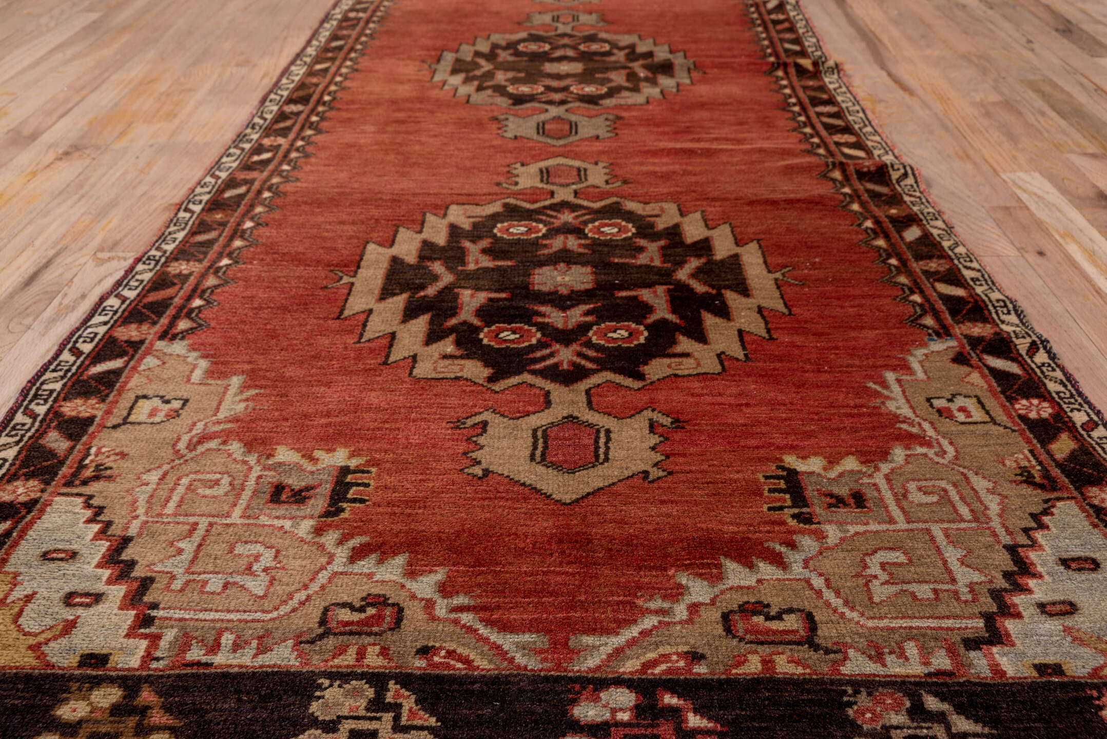 3' x 10' one-of-a-kind handmade vintage Oushak runner rug. Color palette: brown, pink, gray, red