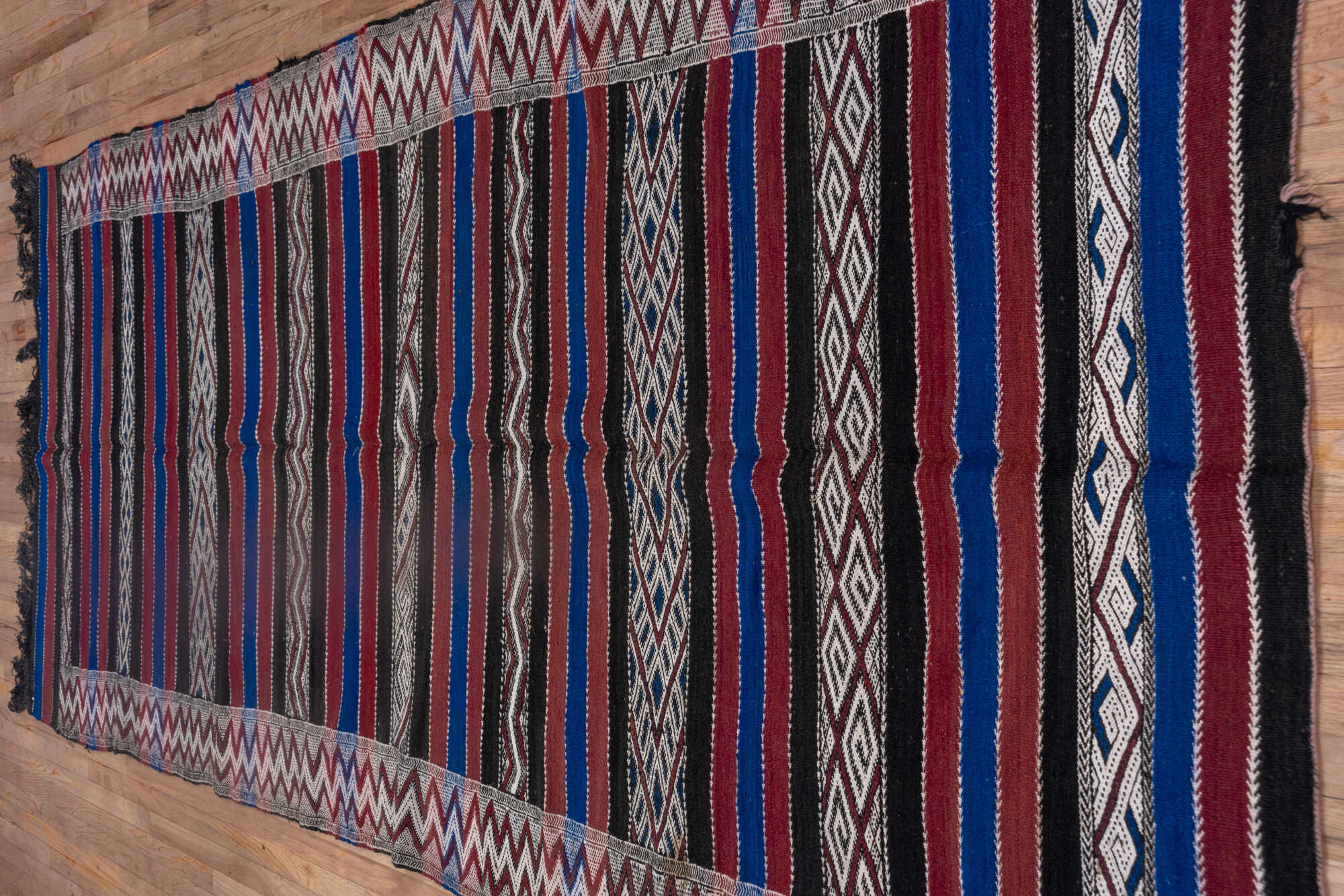 5' x 11' one-of-a-kind handmade vintage Kilim runner rug. Color palette: black, blue, brown, dark gray, gray, light gray