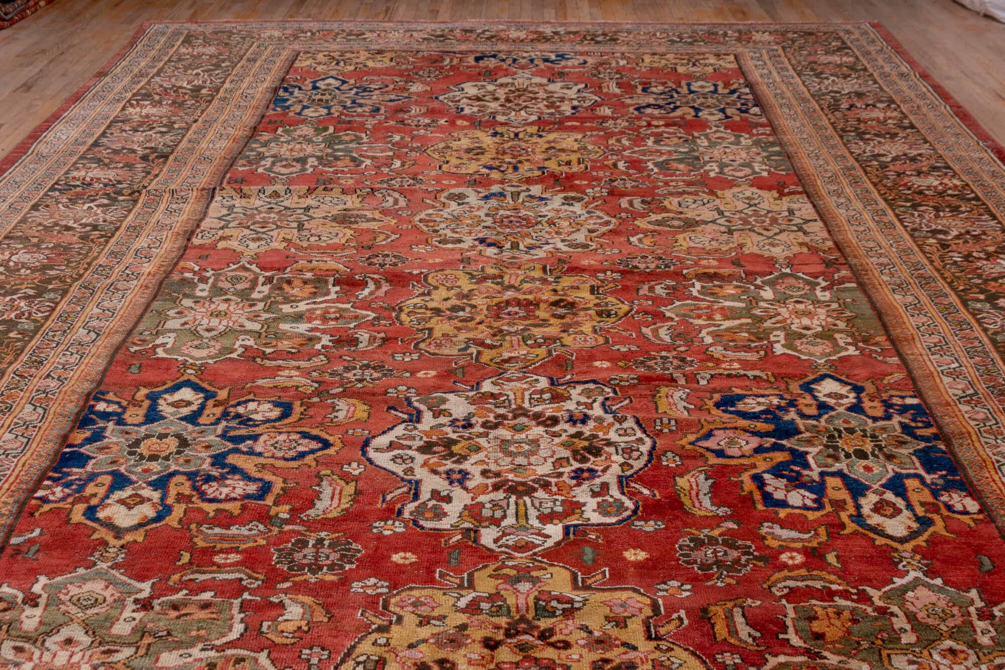 11' x 19' one-of-a-kind handmade vintage Sultanabad oversize rug. Color palette: blue, brown, gray, light gray, pink, red
