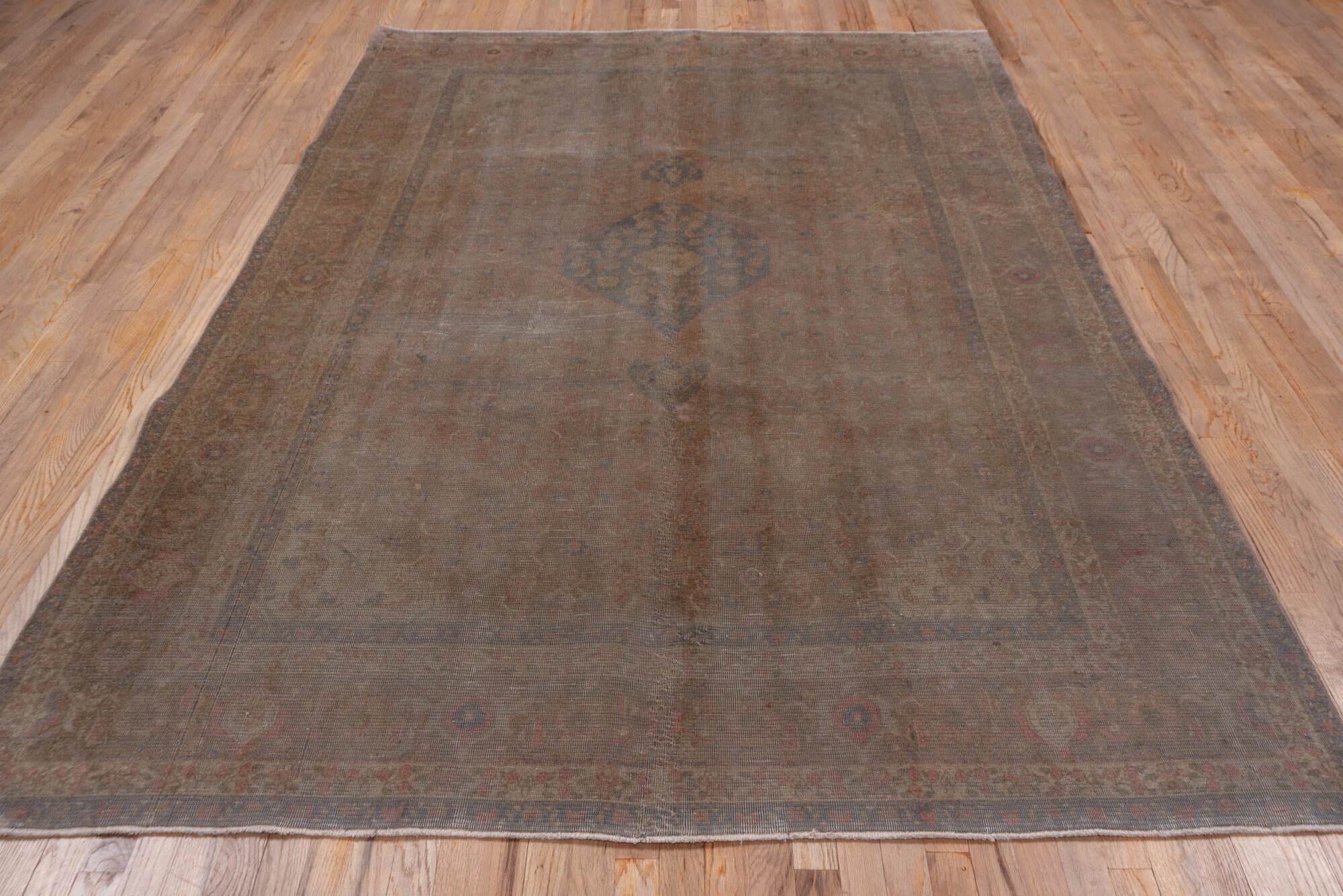 6' x 9' one-of-a-kind handmade vintage Tabriz medium size rug. Color palette: black, brown, gray, pink