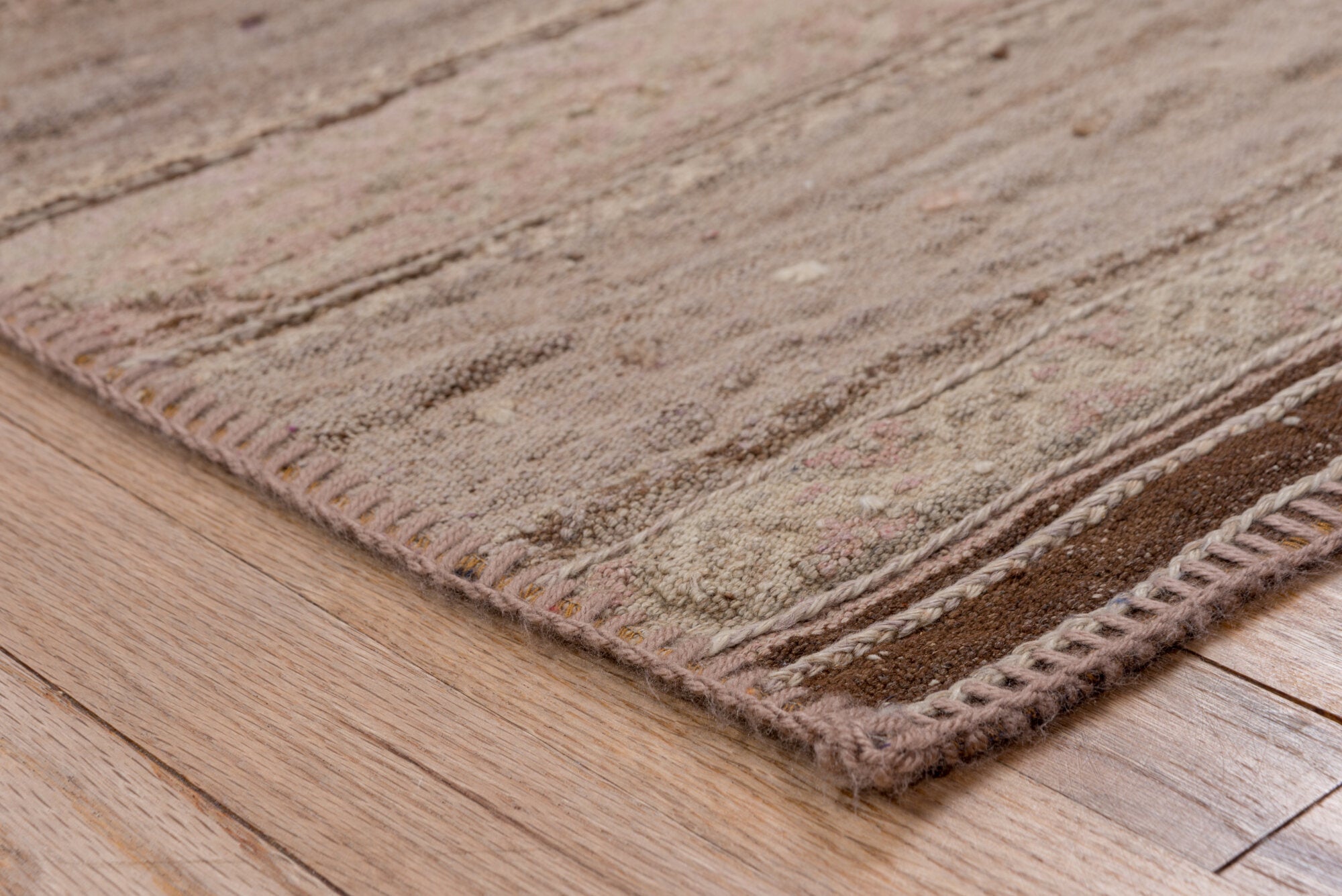 2' x 10' one-of-a-kind handmade vintage Kilim runner rug. Color palette: brown, gray, off-white, pink, snow, white