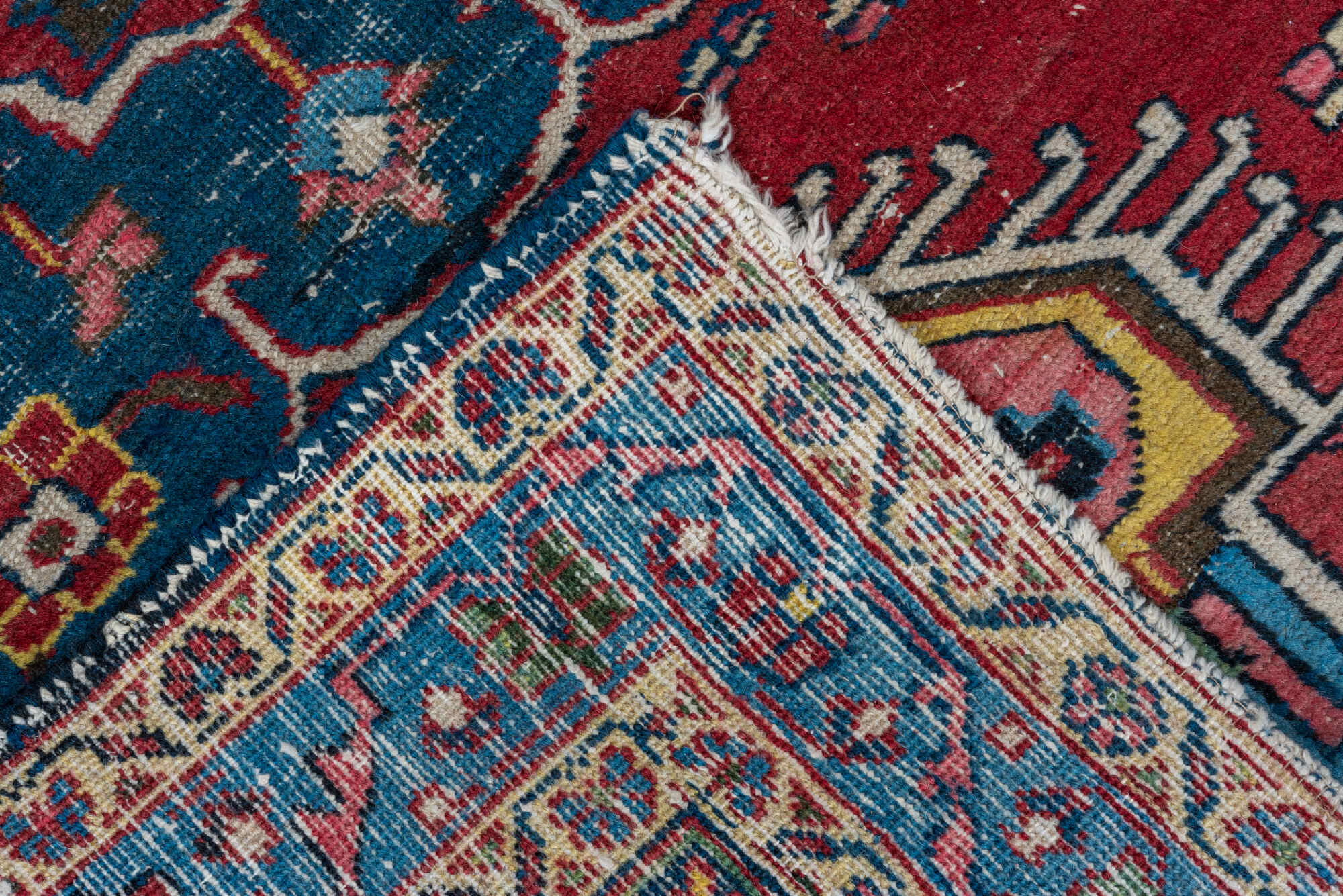 2' x 3' one-of-a-kind handmade vintage Heriz small size rug. Color palette: gray, red, brown, blue, black, pink