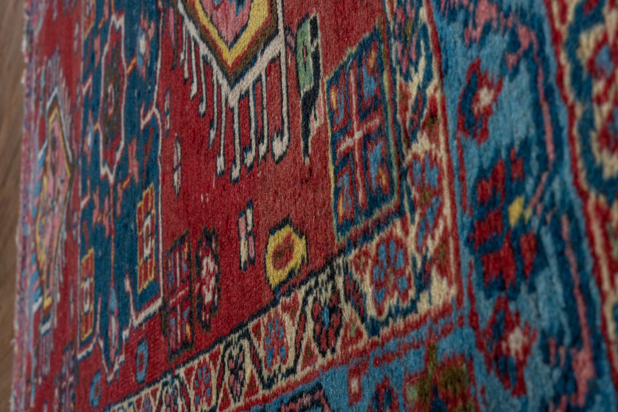 2' x 3' one-of-a-kind handmade vintage Heriz small size rug. Color palette: gray, red, brown, blue, black, pink