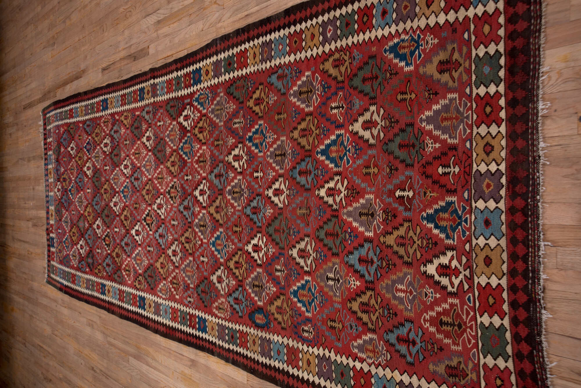 5' x 13' one-of-a-kind handmade vintage Kilim rug. Color palette: gray, red, brown, pink, blue