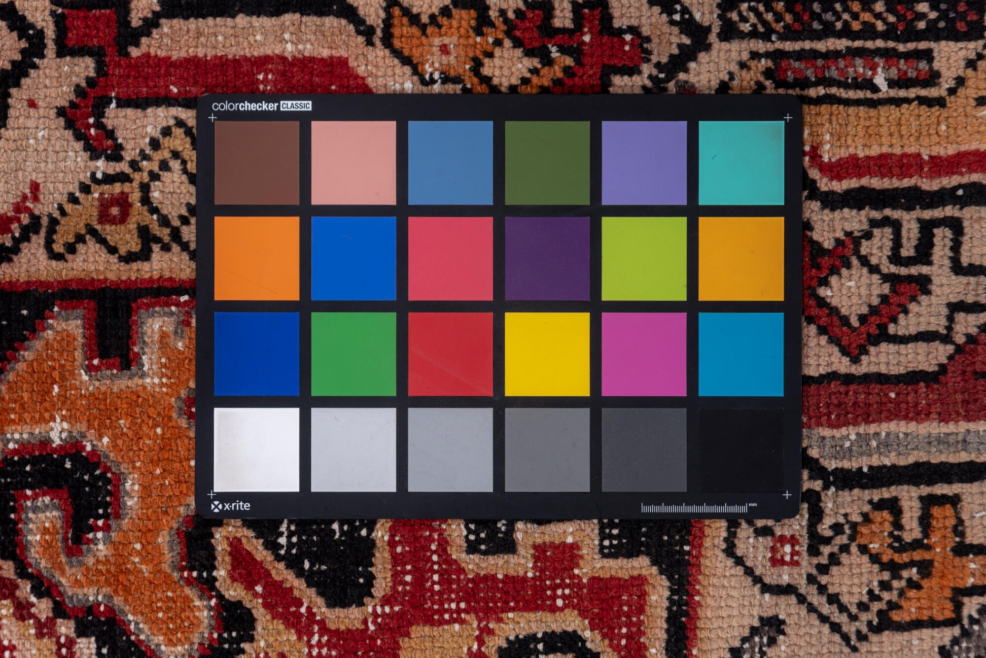 3' x 8' one-of-a-kind handmade vintage Oushak runner rug. Color palette: black, brown, charcoal, gray, pink, red, redwood