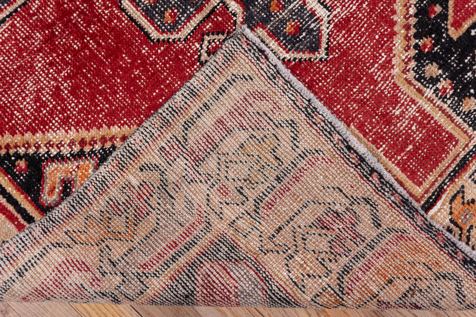 3' x 8' one-of-a-kind handmade vintage Oushak runner rug. Color palette: black, brown, charcoal, gray, pink, red, redwood