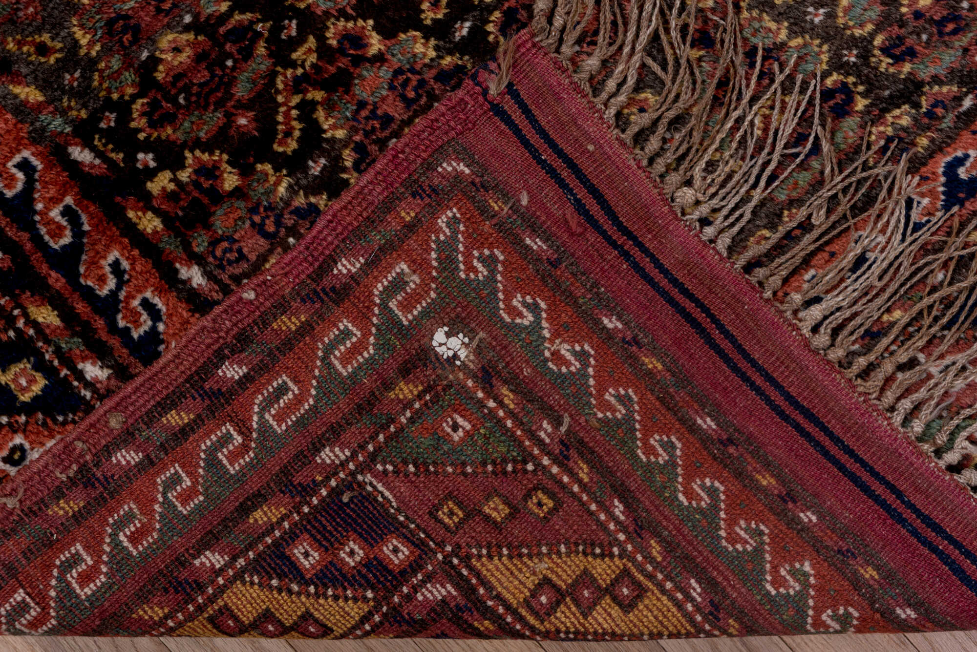 4' x 9' one-of-a-kind handmade vintage Kurd rug. Color palette: brown, dark gray, gray, light gray, off-white, pink, red