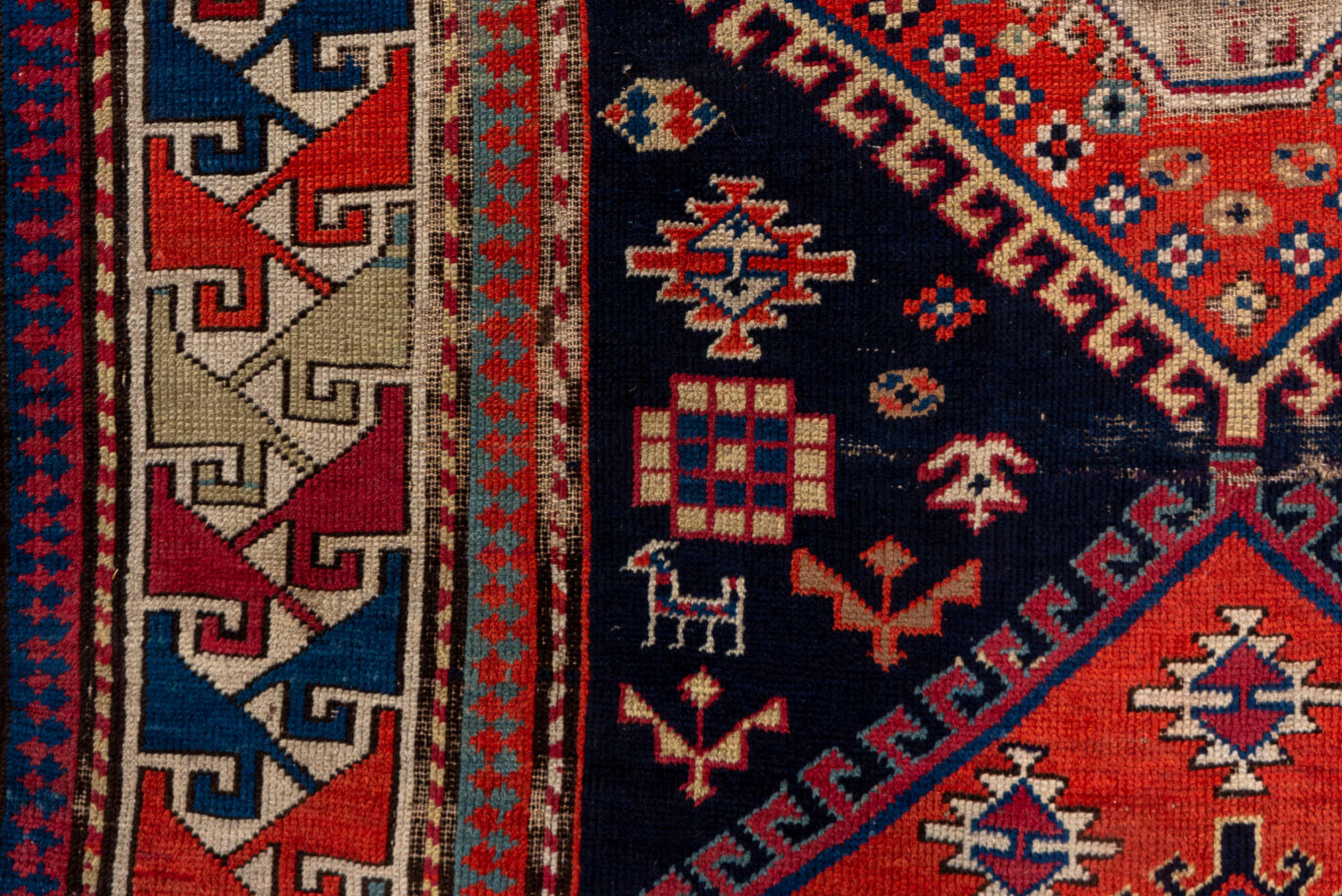 4' x 9' one-of-a-kind handmade vintage Shirvan runner rug. Color palette: blue, brown, gray, pink, red, redwood