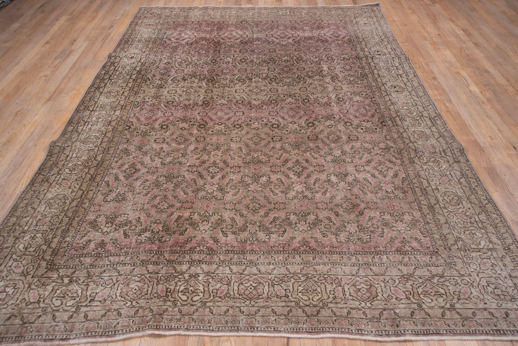 7' x 10' one-of-a-kind handmade vintage Sivas large size rug. Color palette: brown, gray, pink
