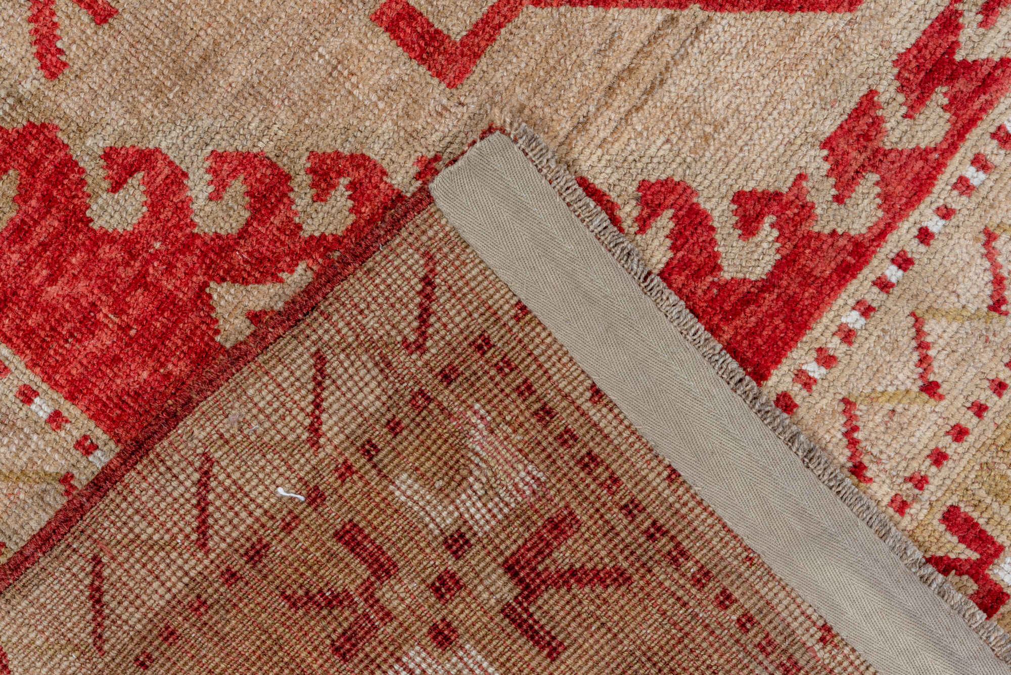 4' x 7' one-of-a-kind handmade vintage Caucasian rug. Color palette: brown, gray, light gray, off-white, pink, red