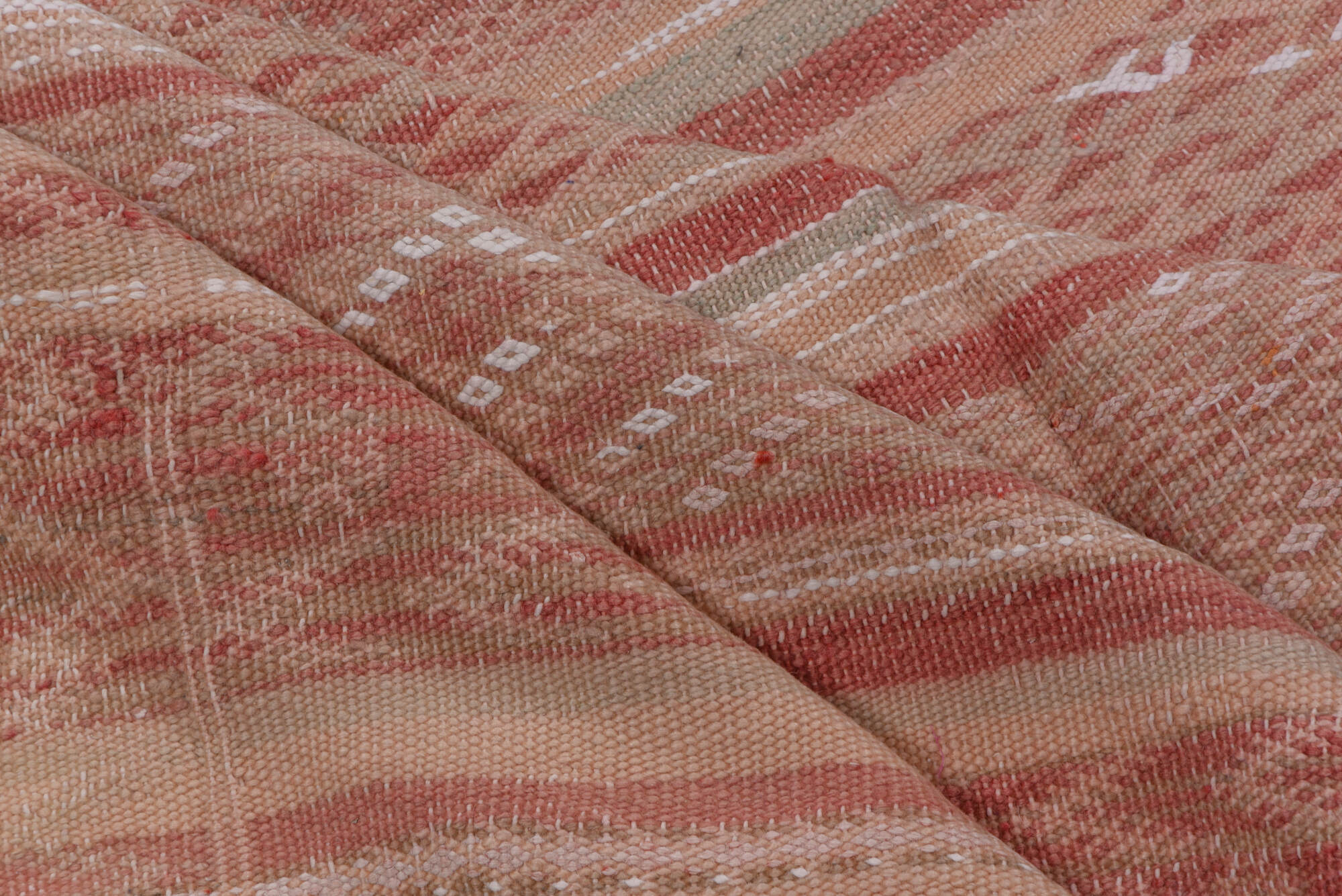 4' x 10' one-of-a-kind handmade vintage Moroccan runner rug. Color palette: brown, gray, light gray, off-white, pink, red