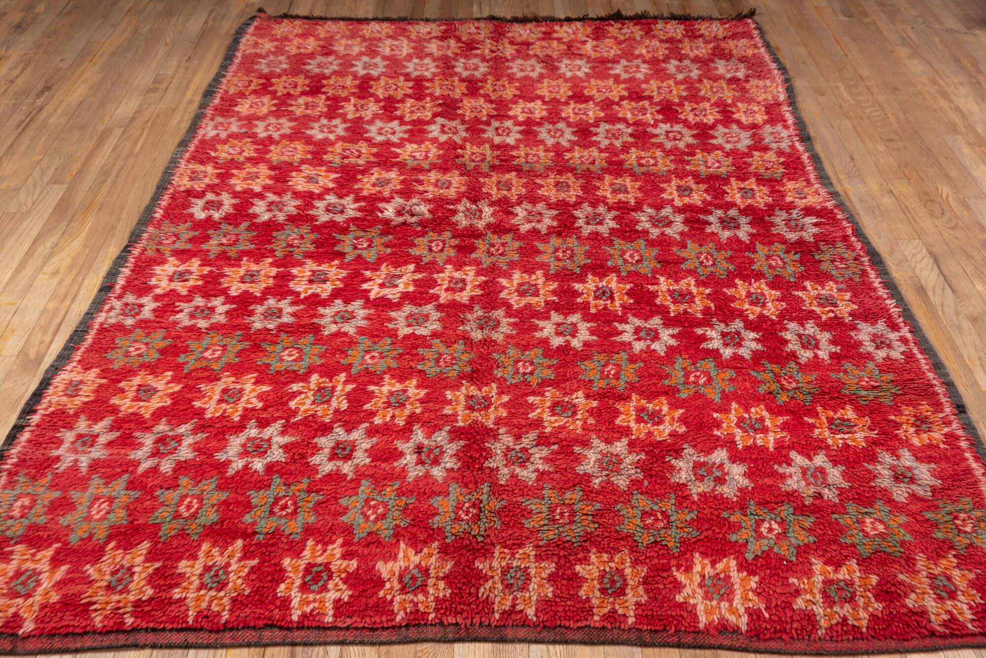 6' x 9' one-of-a-kind handmade vintage Moroccan medium size rug. Color palette: brown, burgundy, indian red, pink, red
