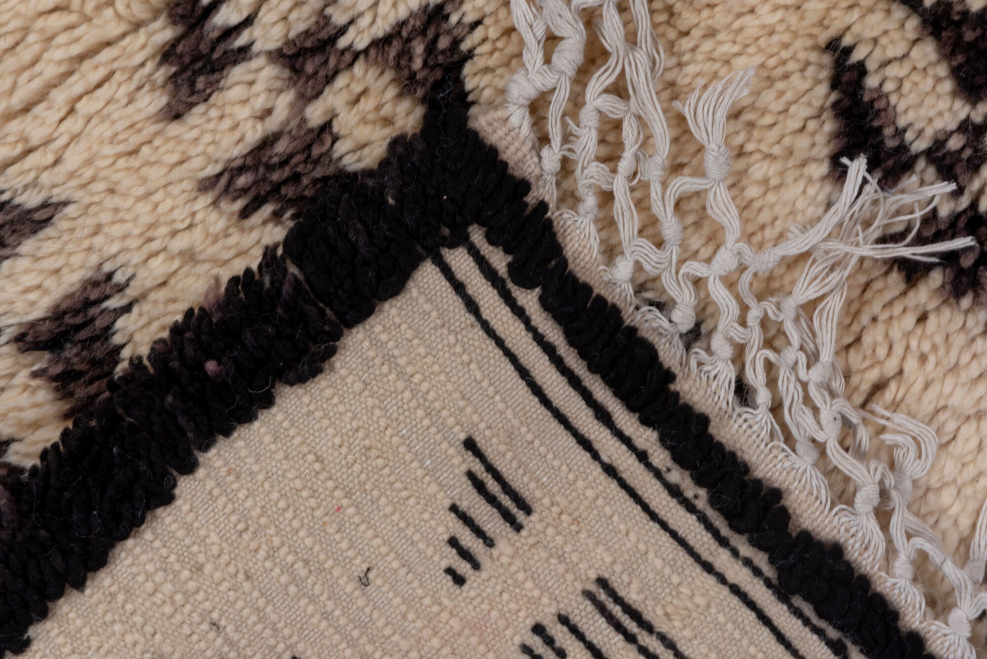 5' x 8' one-of-a-kind handmade vintage Moroccan medium size rug. Color palette: brown, gray, light gray, off-white, orange