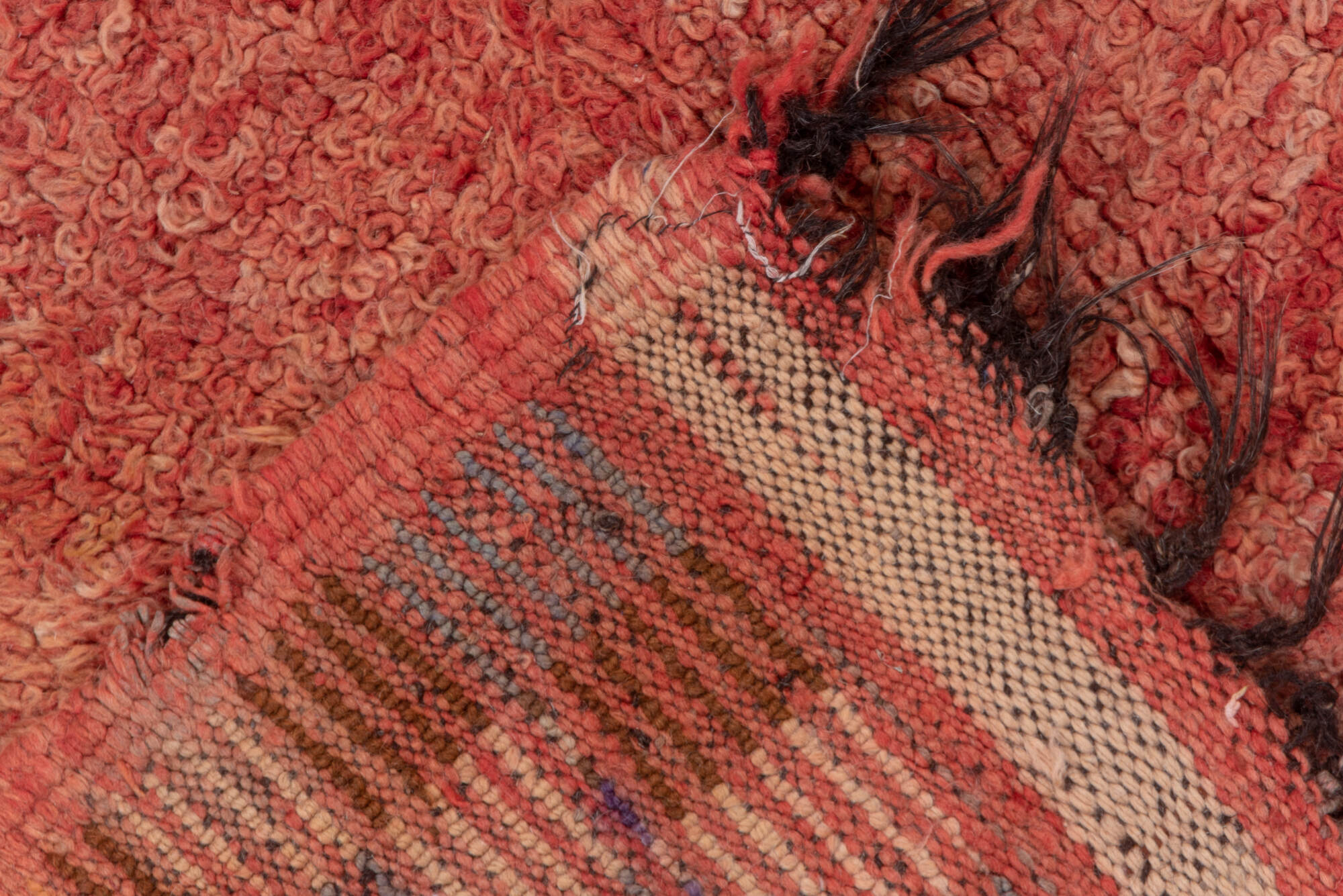 3' x 9' one-of-a-kind handmade vintage Moroccan runner rug. Color palette: brown, orange, pink, red