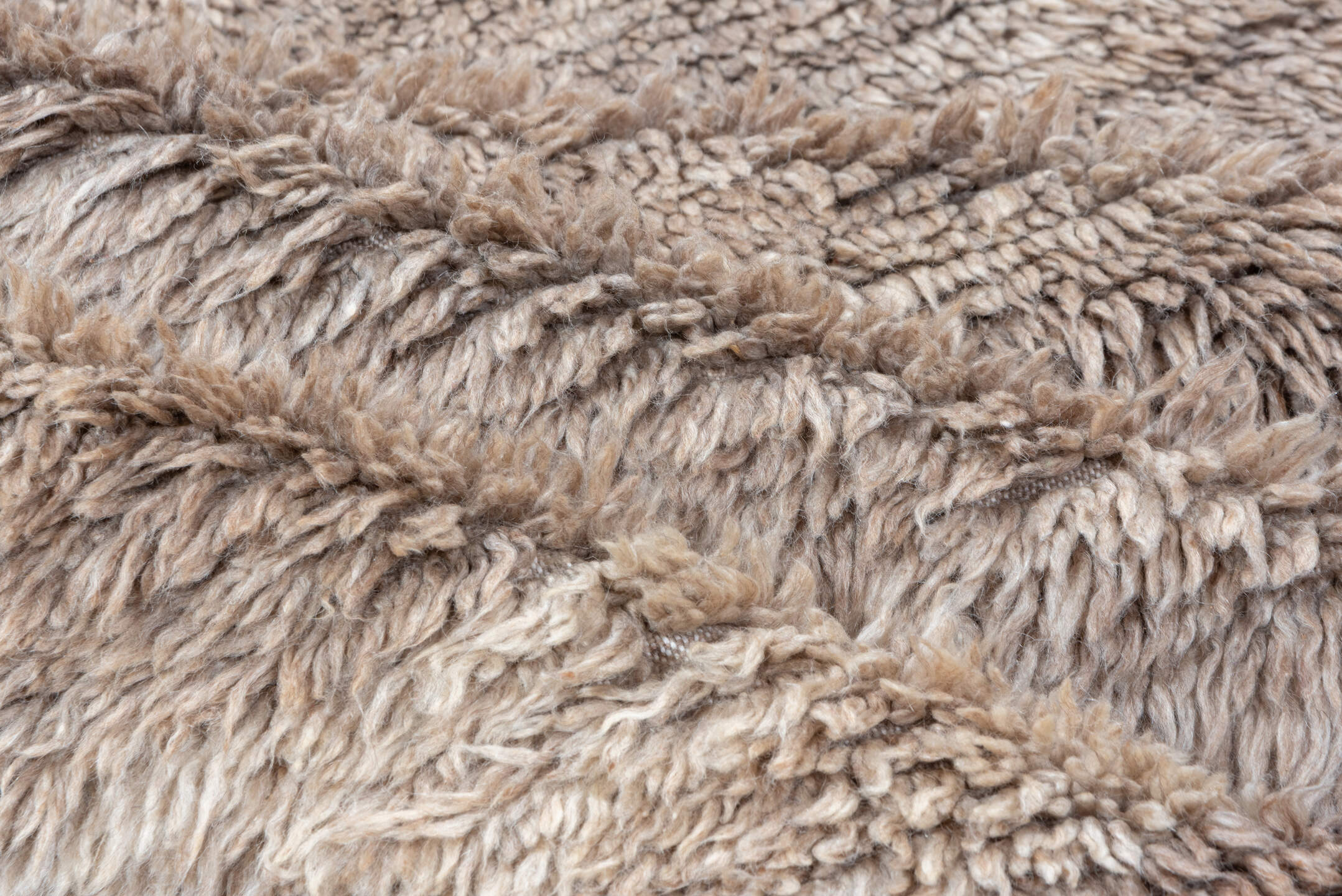 5' x 9' one-of-a-kind handmade vintage Moroccan medium size rug. Color palette: gray, pink, light gray, brown, off-white