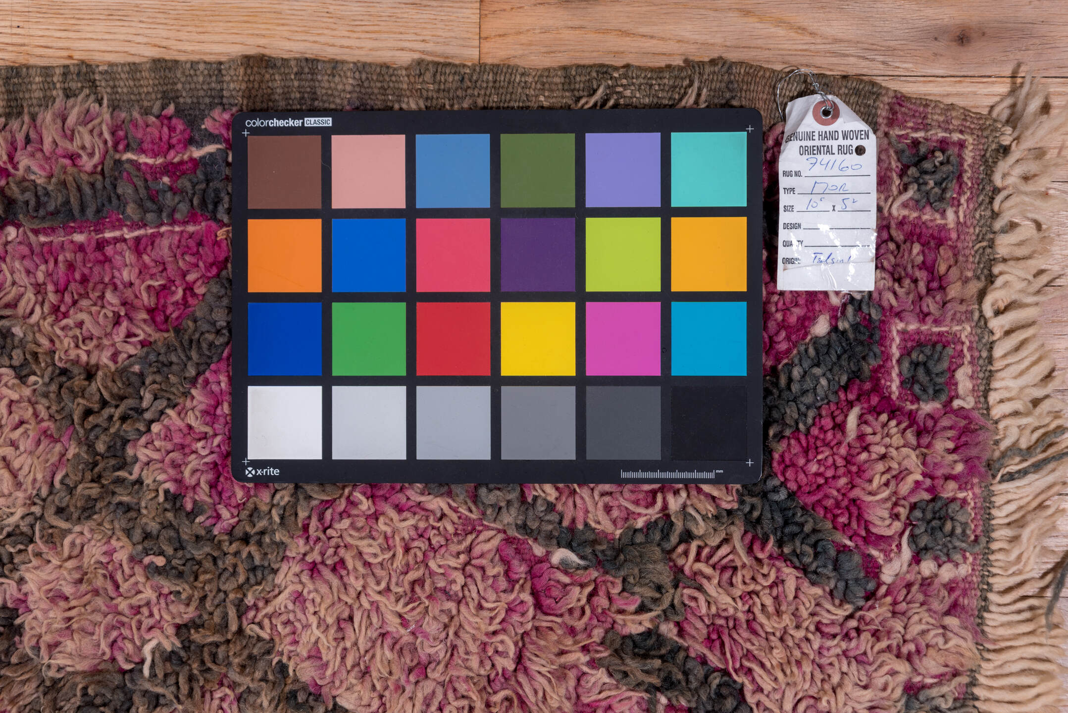 5' x 10' one-of-a-kind handmade vintage Moroccan medium size rug. Color palette: gray, pink, light gray, off-white, brown