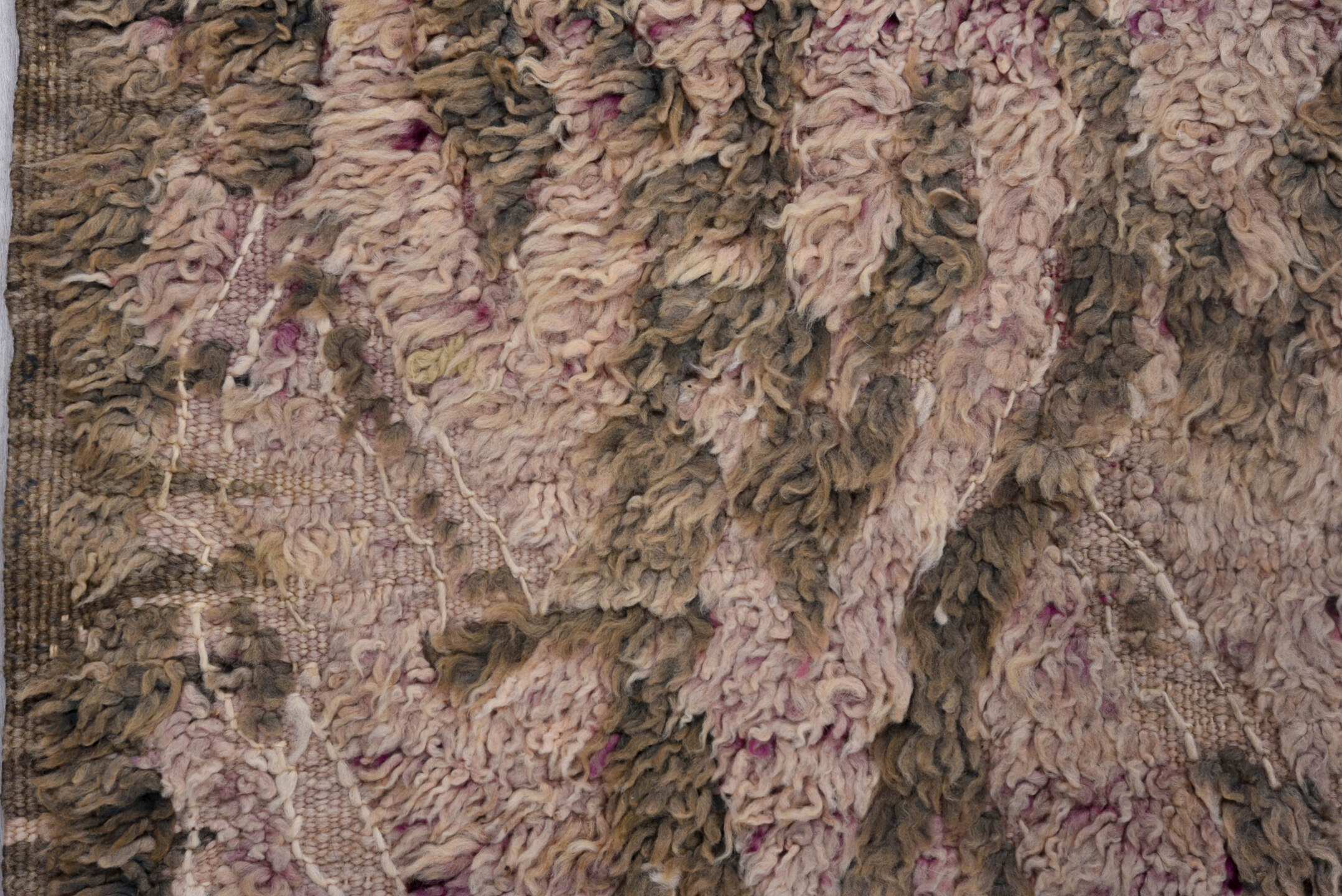 5' x 10' one-of-a-kind handmade vintage Moroccan medium size rug. Color palette: gray, pink, light gray, off-white, brown