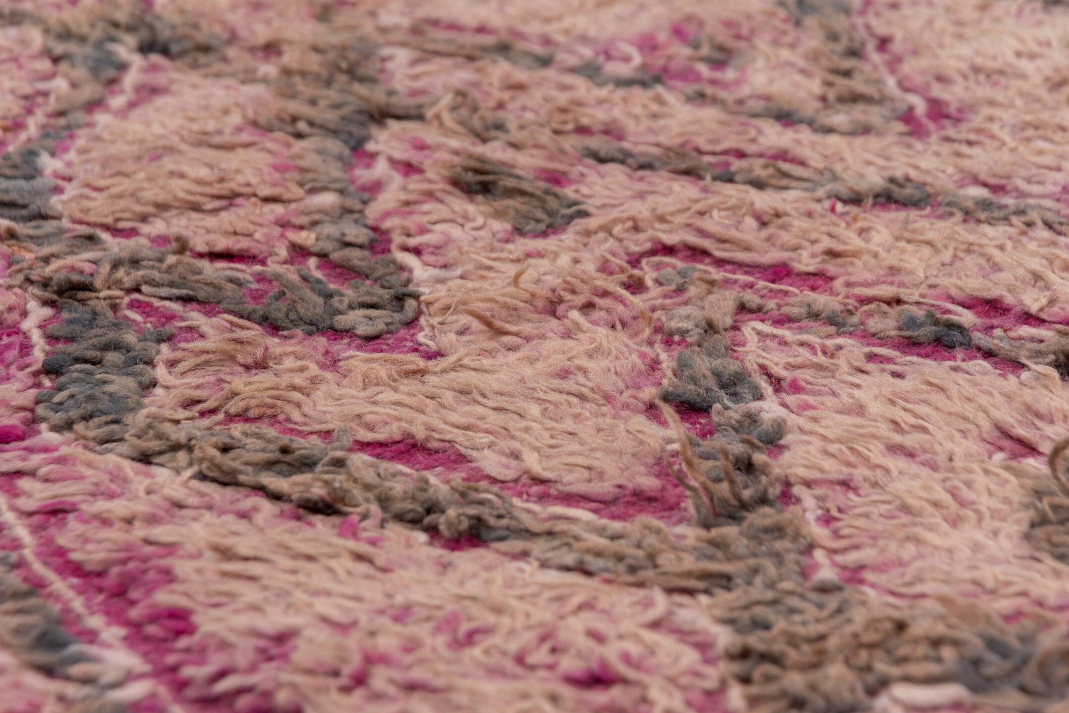 5' x 10' one-of-a-kind handmade vintage Moroccan medium size rug. Color palette: gray, pink, light gray, off-white, brown