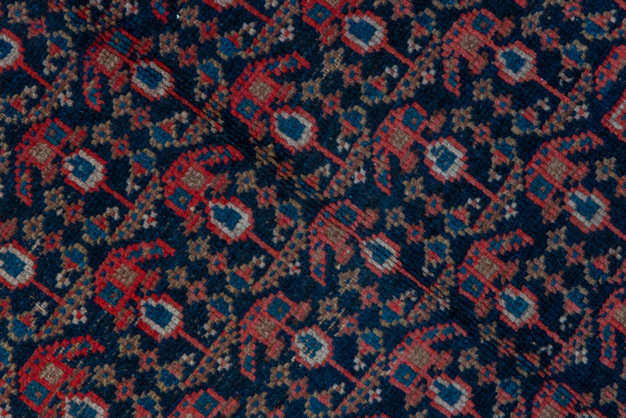 5' x 11' one-of-a-kind handmade vintage Malayer rug. Color palette: black, blue, brown, charcoal, gray, pink, red