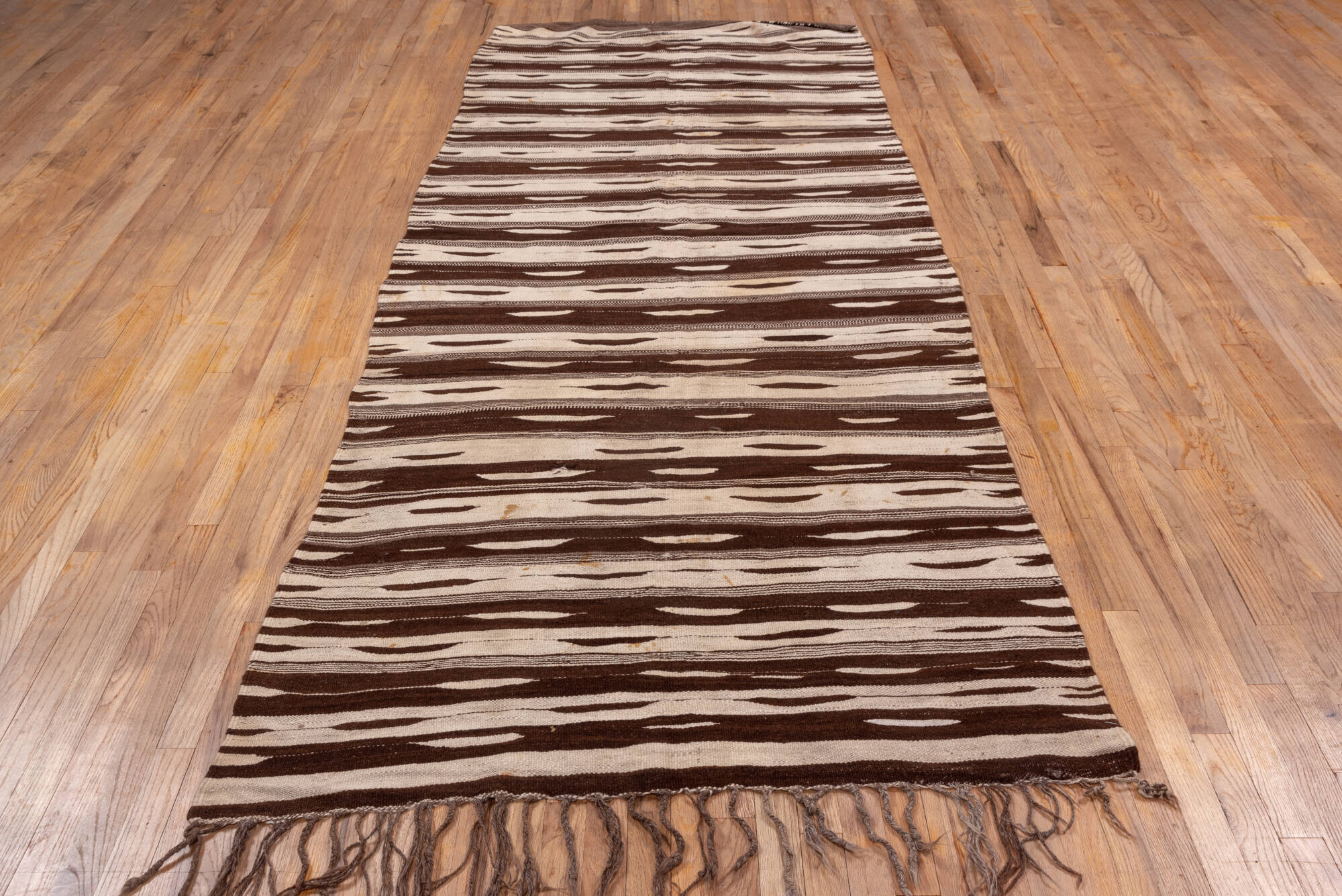 4' x 10' one-of-a-kind handmade vintage Kilim runner rug. Color palette: brown, gray, light gray, off-white, pink, snow