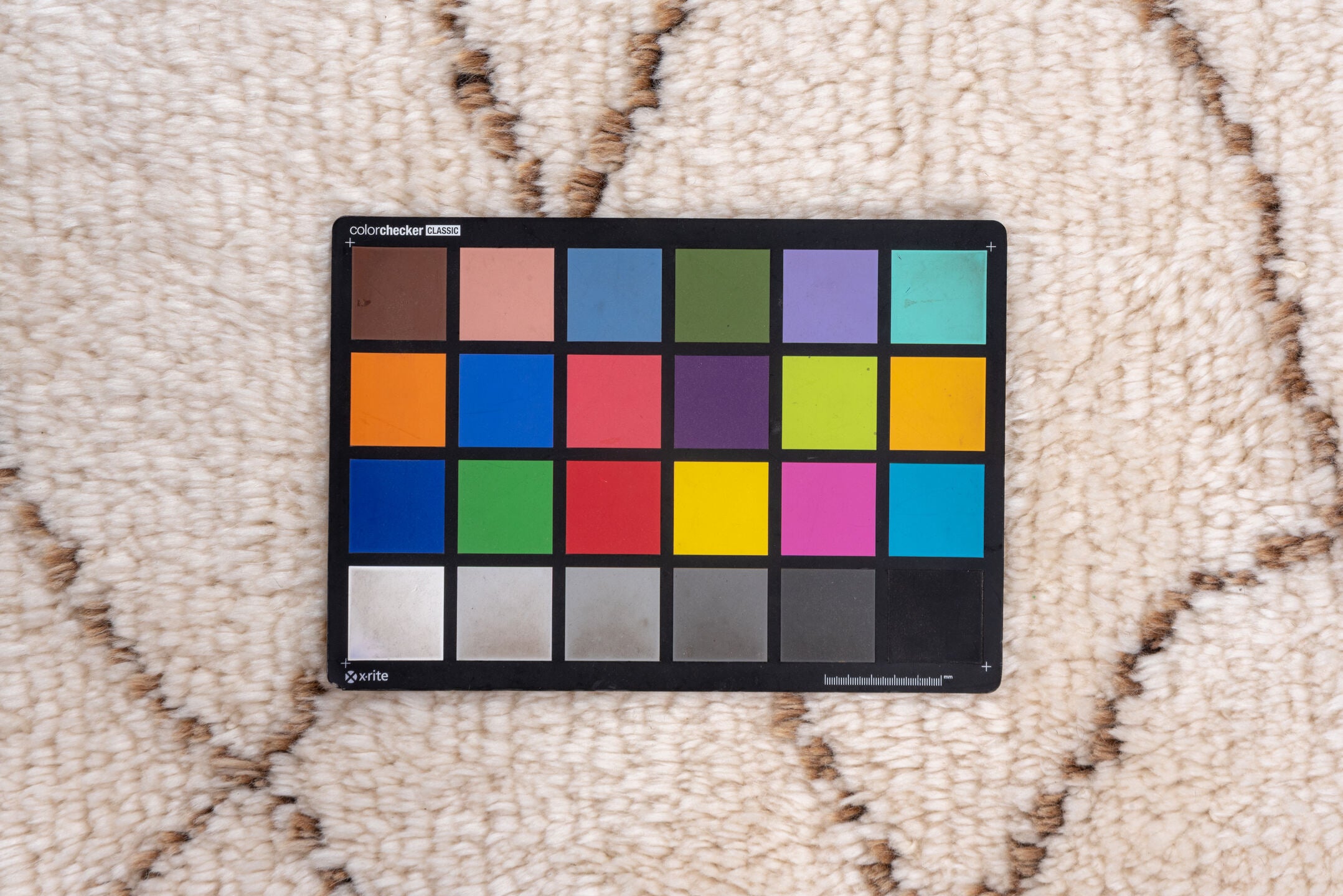 5' x 7' one-of-a-kind handmade vintage Moroccan rug. Color palette: light gray, pink, off-white, gray, brown, lavender blush