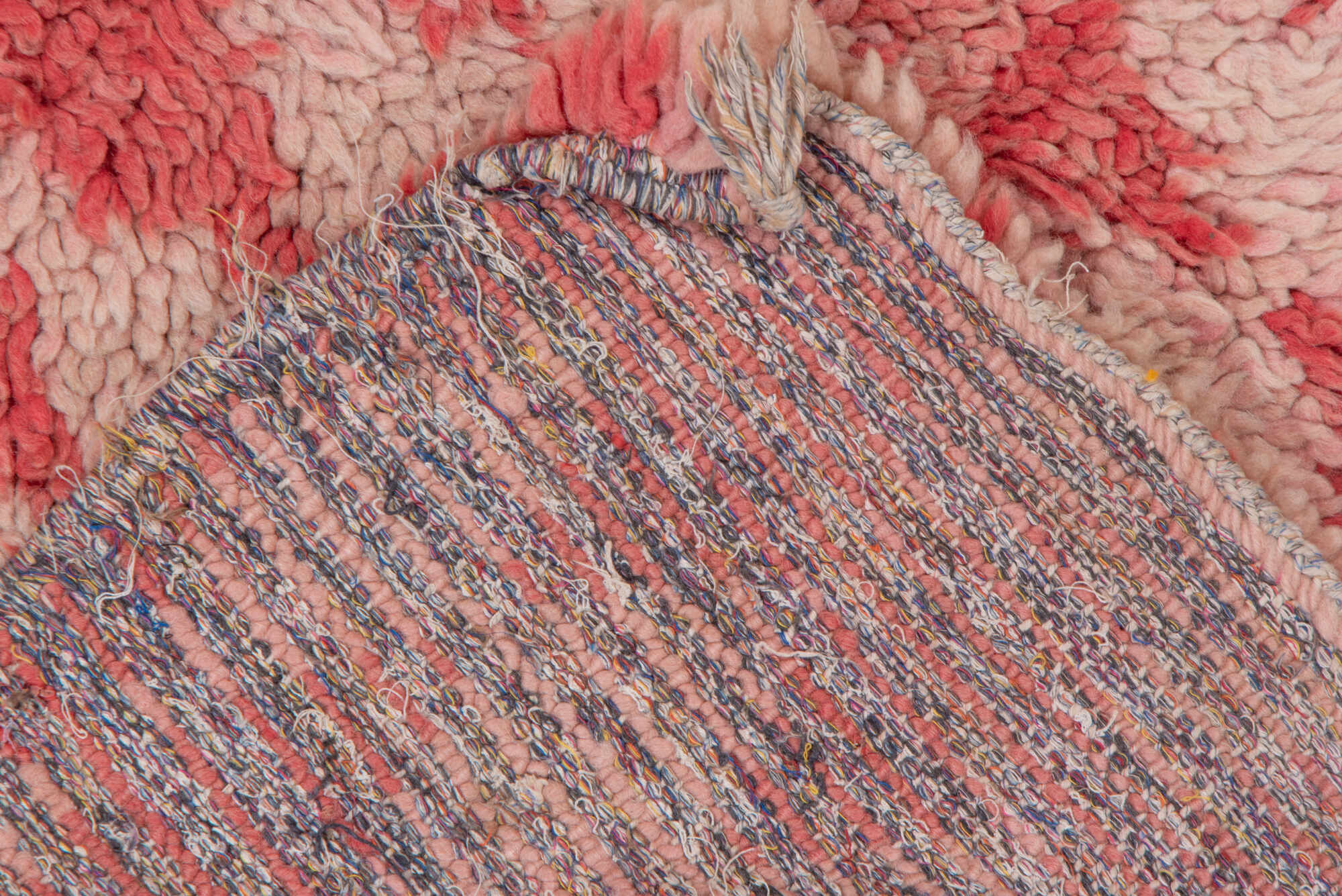 2' x 5' one-of-a-kind handmade vintage Moroccan small size rug. Color palette: brown, gray, orange, pink, red, redwood