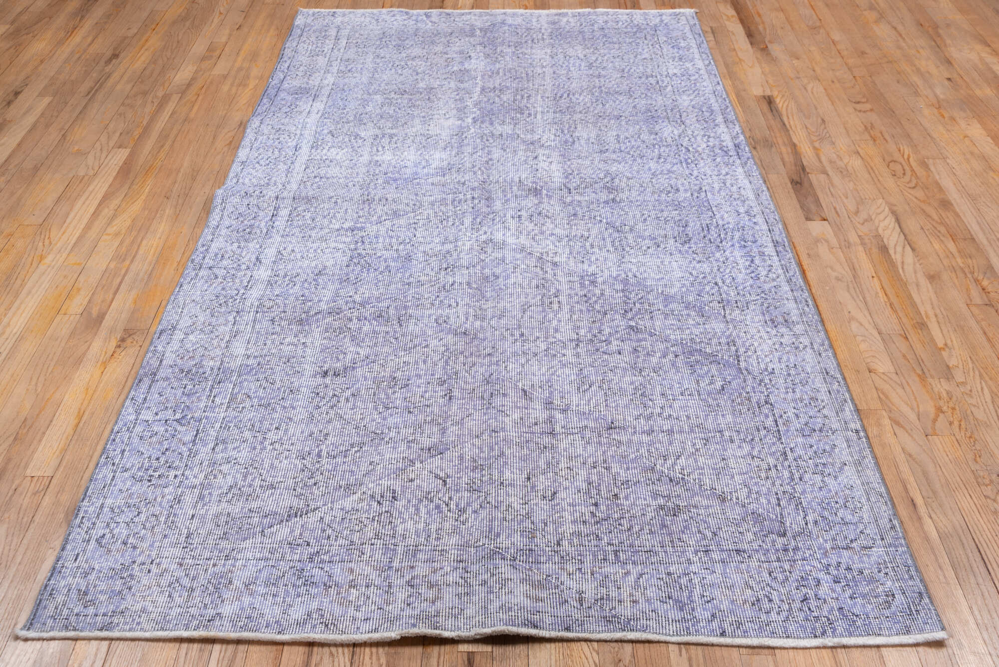 5' x 8' one-of-a-kind handmade vintage Overdyed medium size rug. Color palette: blue, gray, lavender, light blue, light gray