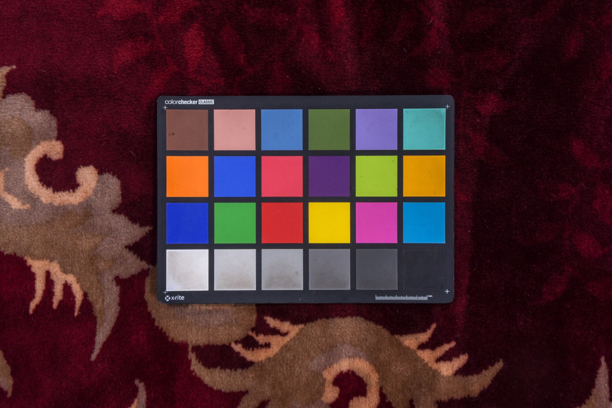 10' x 17' one-of-a-kind handmade vintage Chinese rug. Color palette: blue, brown, gray, off-white, orange, pink, red